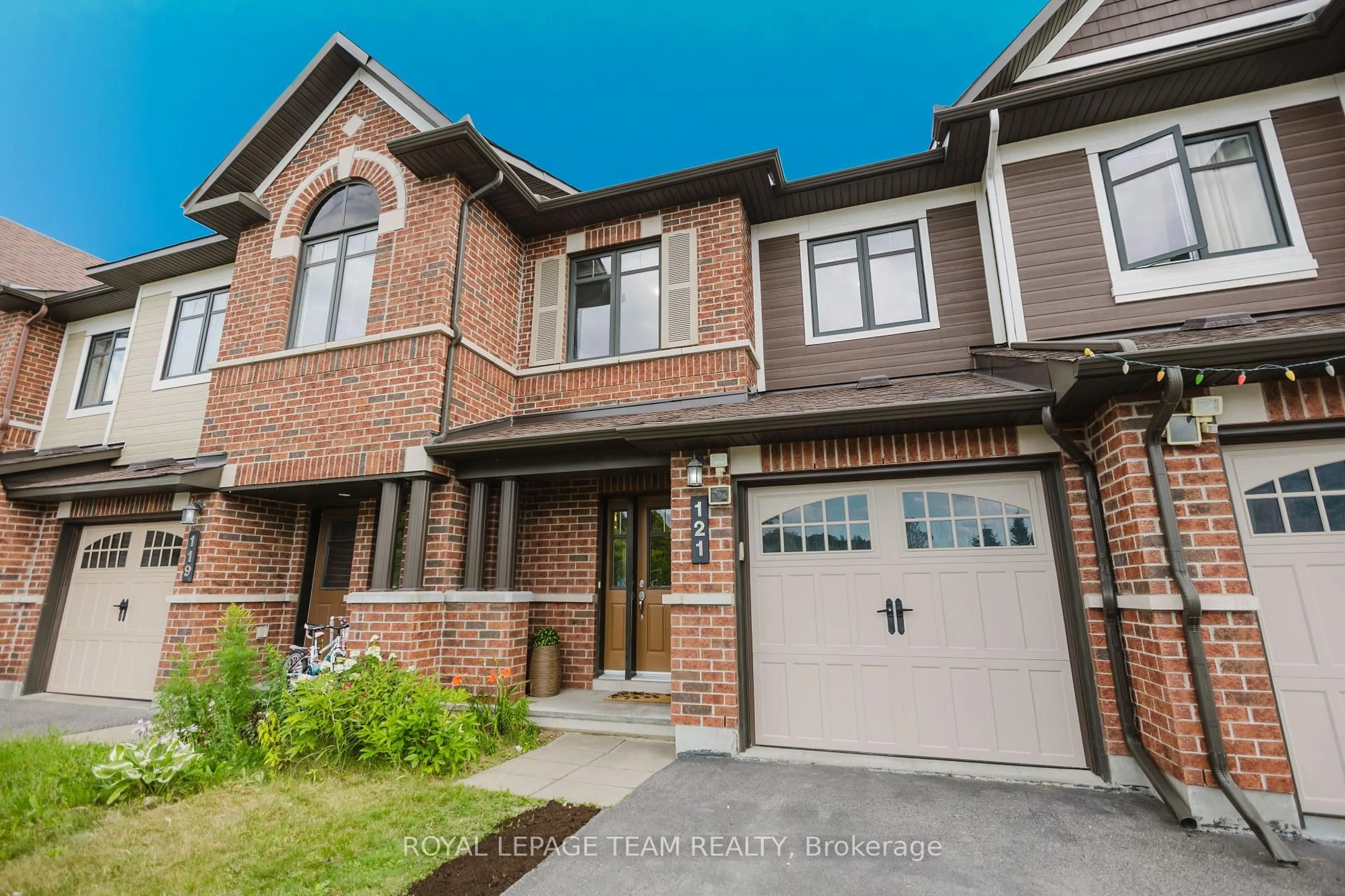 Home with brick exterior material, street for 121 Mancini Way, Ottawa Ontario K2J 5X3
