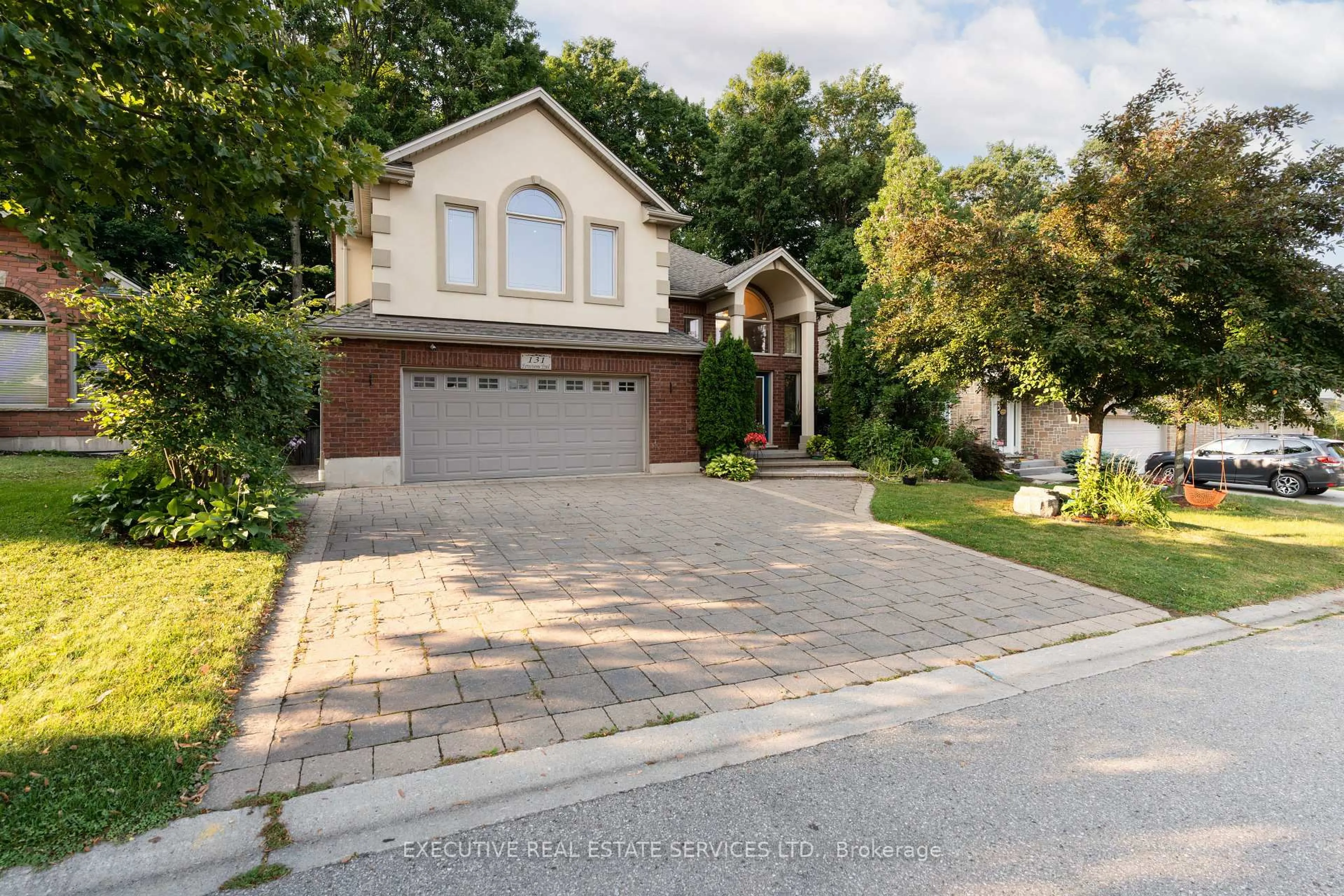 Home with brick exterior material, street for 131 Forestway Tr, Woodstock Ontario N4S 9A7