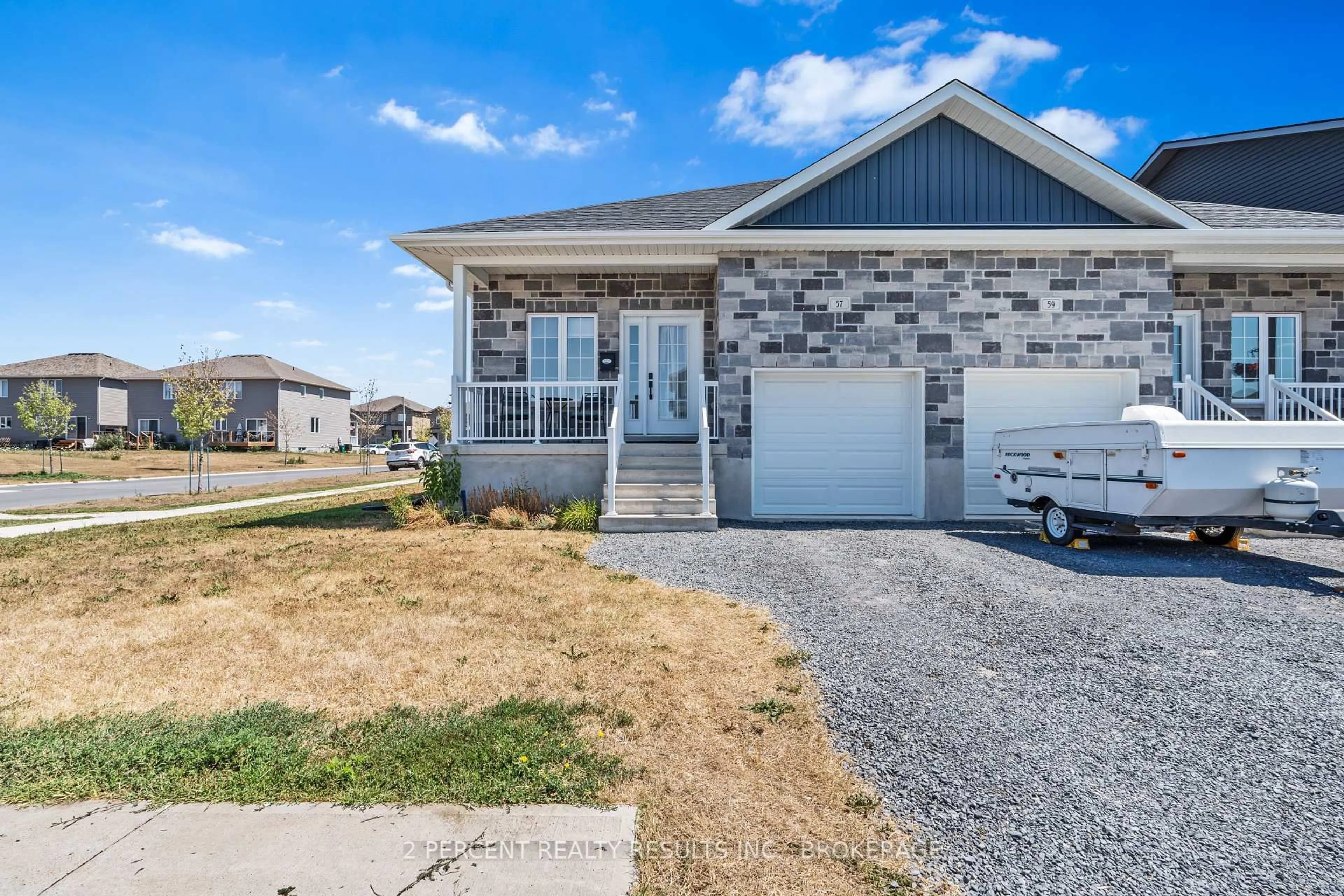 Home with vinyl exterior material, street for 57 Potter Dr, Bissett Creek Ontario K0H 2H0