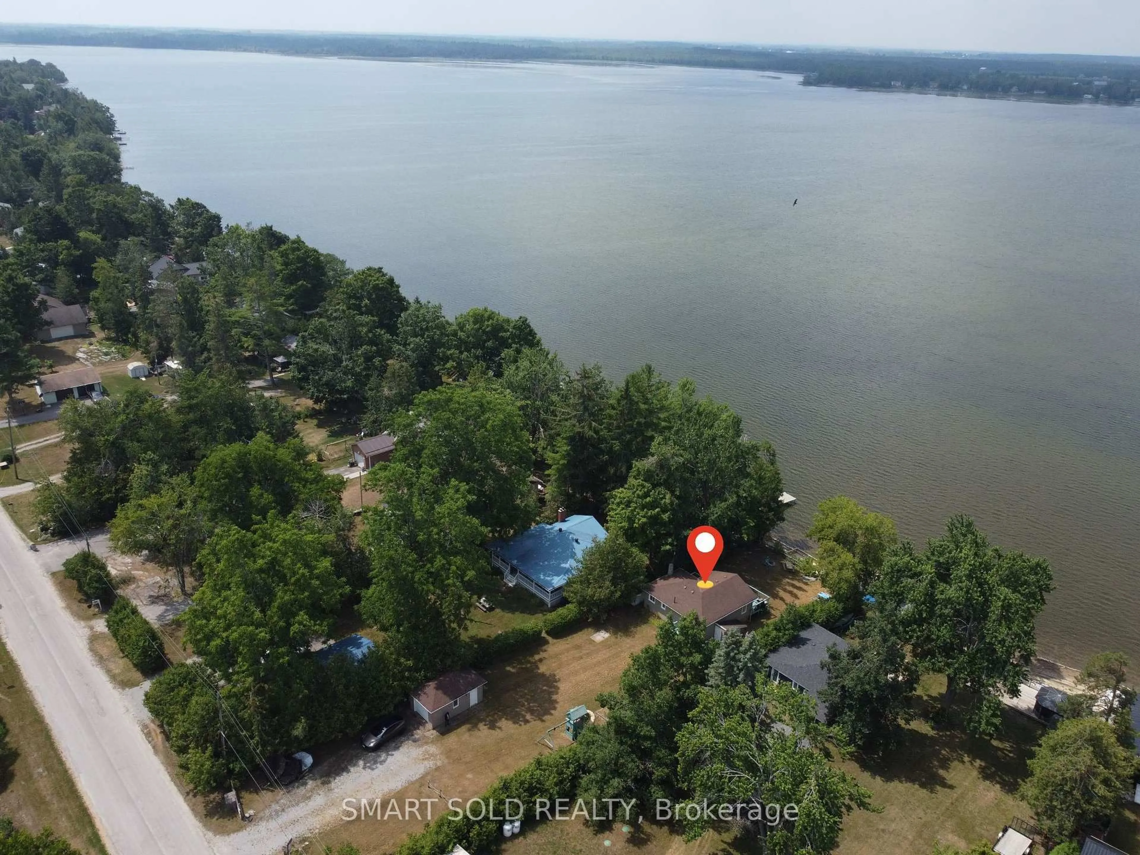 A pic from outside/outdoor area/front of a property/back of a property/a pic from drone, water/lake/river/ocean view for 95 Campbell Beach Rd, Kawartha Lakes Ontario L0K 1B0