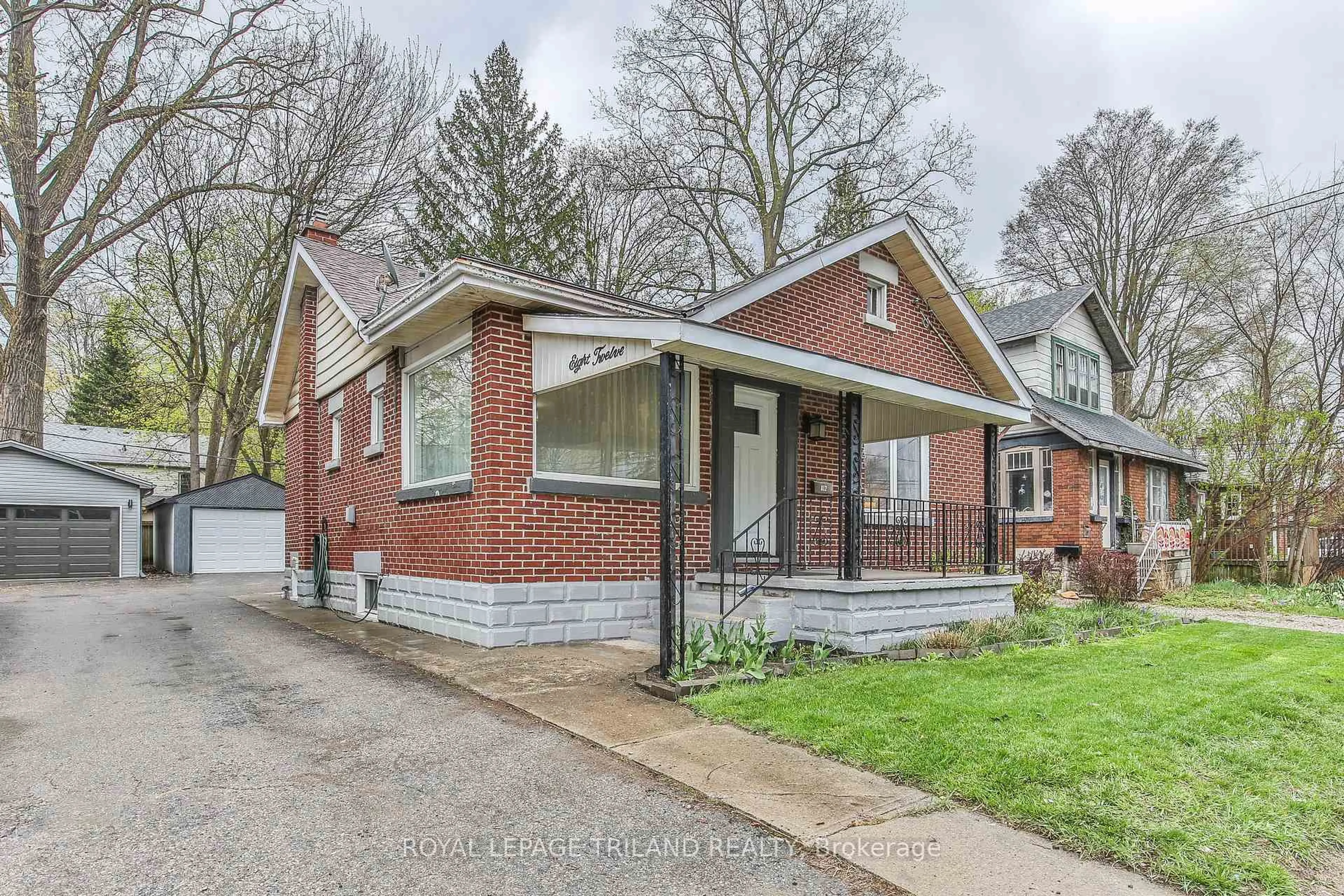 Home with brick exterior material, street for 812 ADELAIDE St, London East Ontario N5Y 2L9