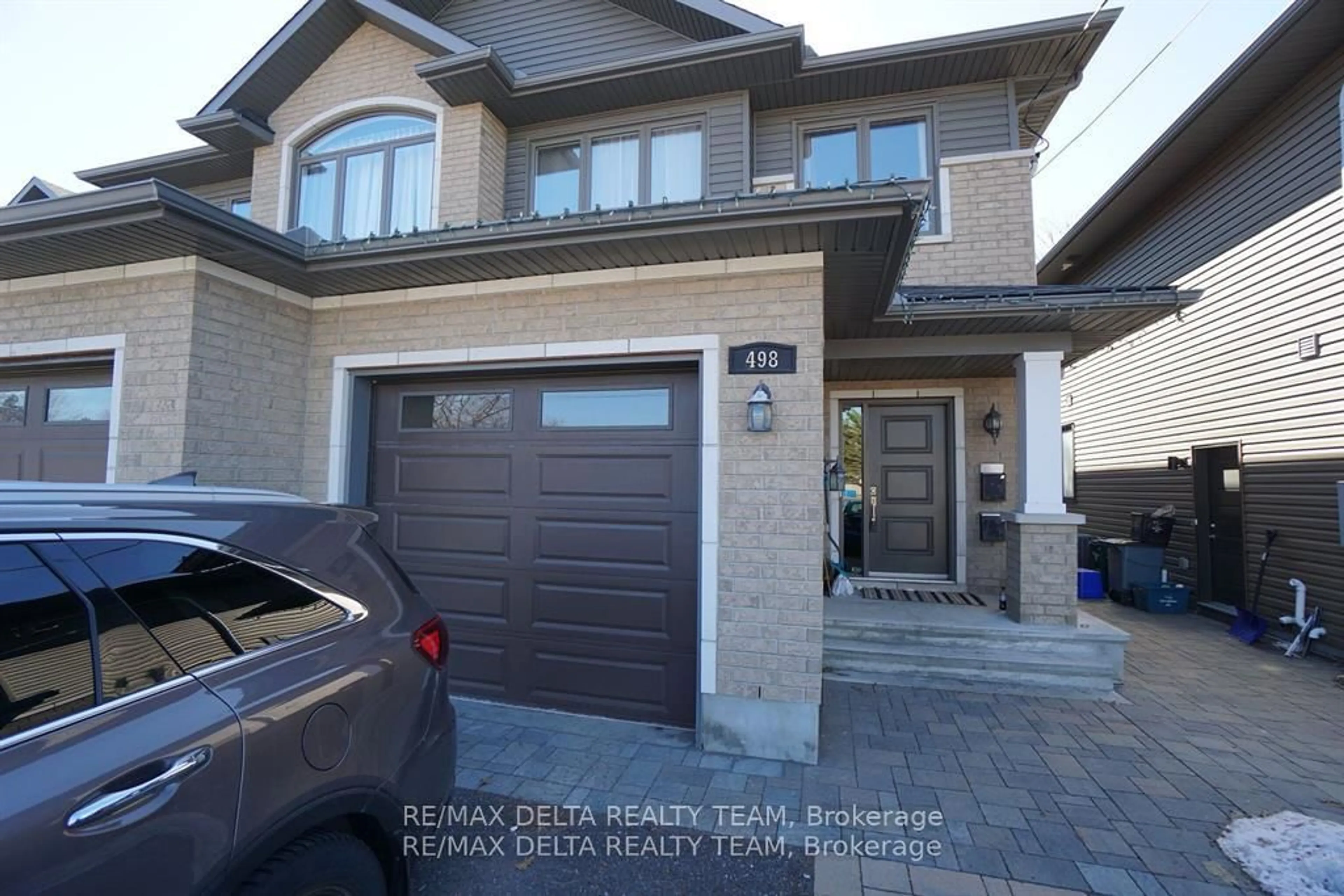 Home with brick exterior material, street for 498 Moodie Dr, Ottawa Ontario K2H 8A7