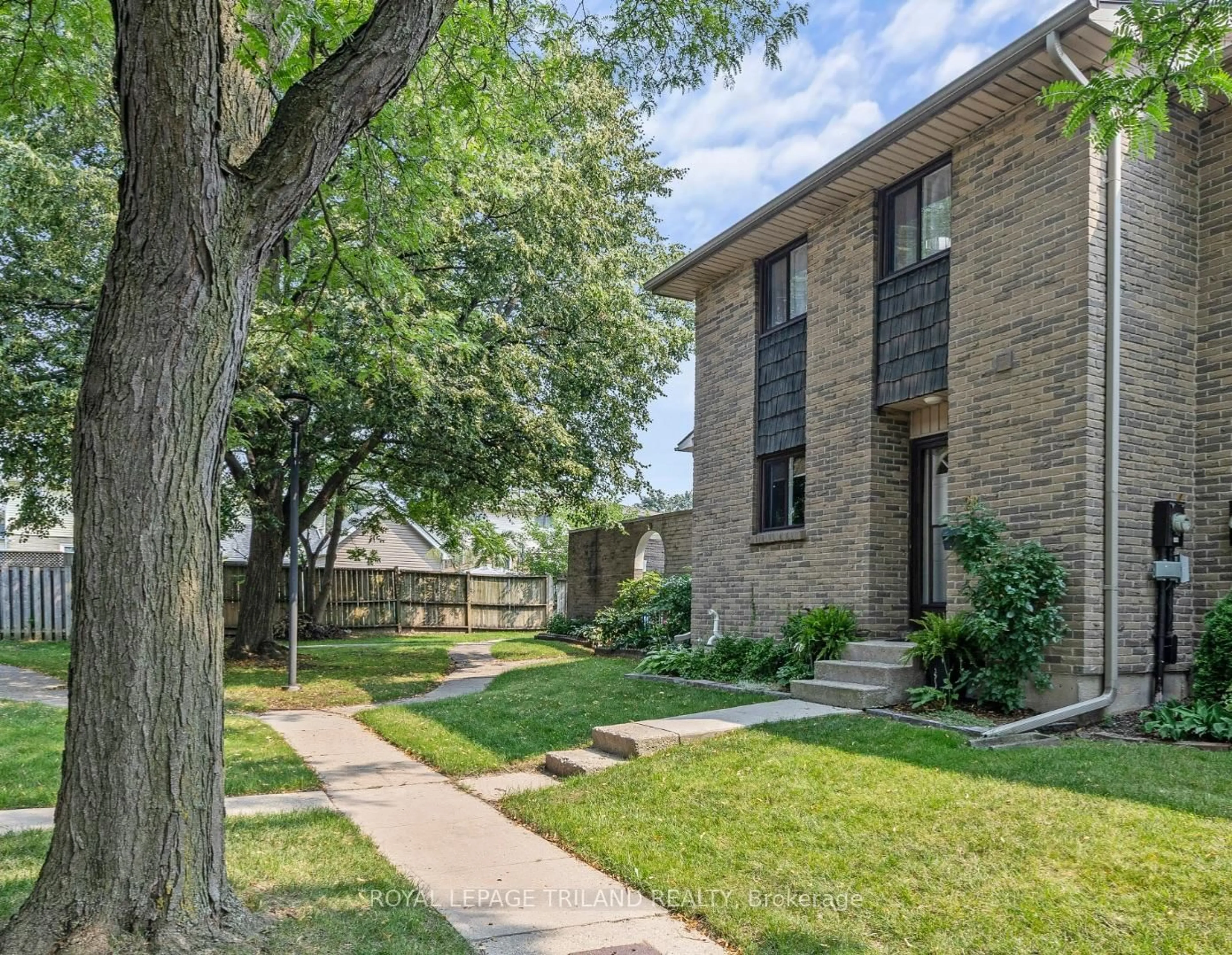 Home with brick exterior material, street for 474 Southdale Rd #28, London South Ontario N6E 1A4