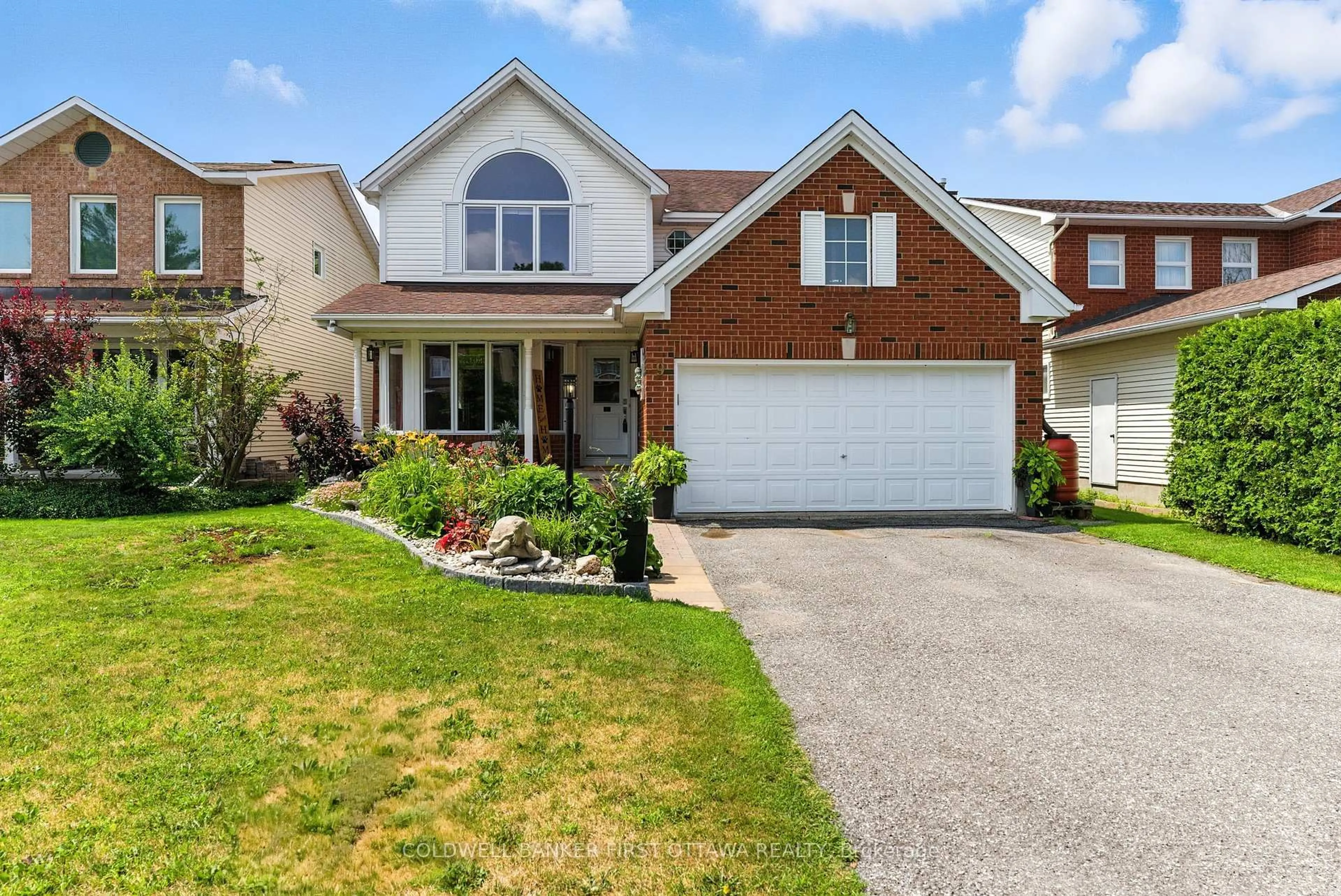 Home with brick exterior material, street for 9 Kluane Rdge, Kanata Ontario K2M 1Z7