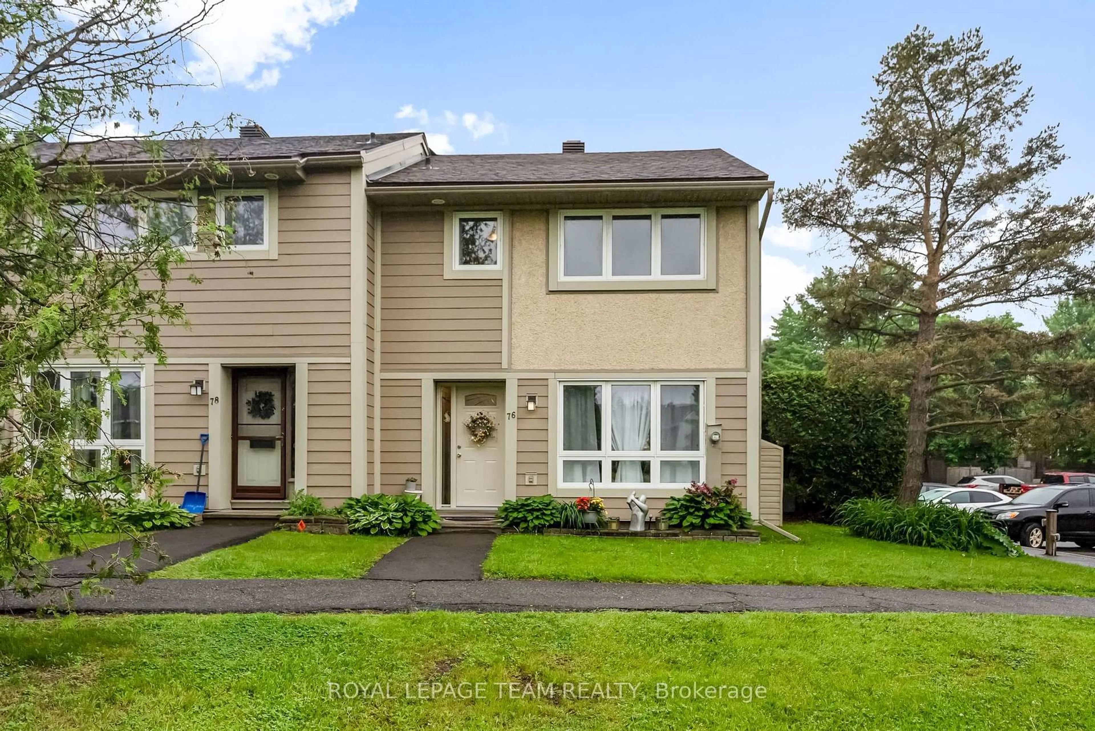Home with vinyl exterior material, street for 76 Peary Way, Ottawa Ontario K2L 1Z8
