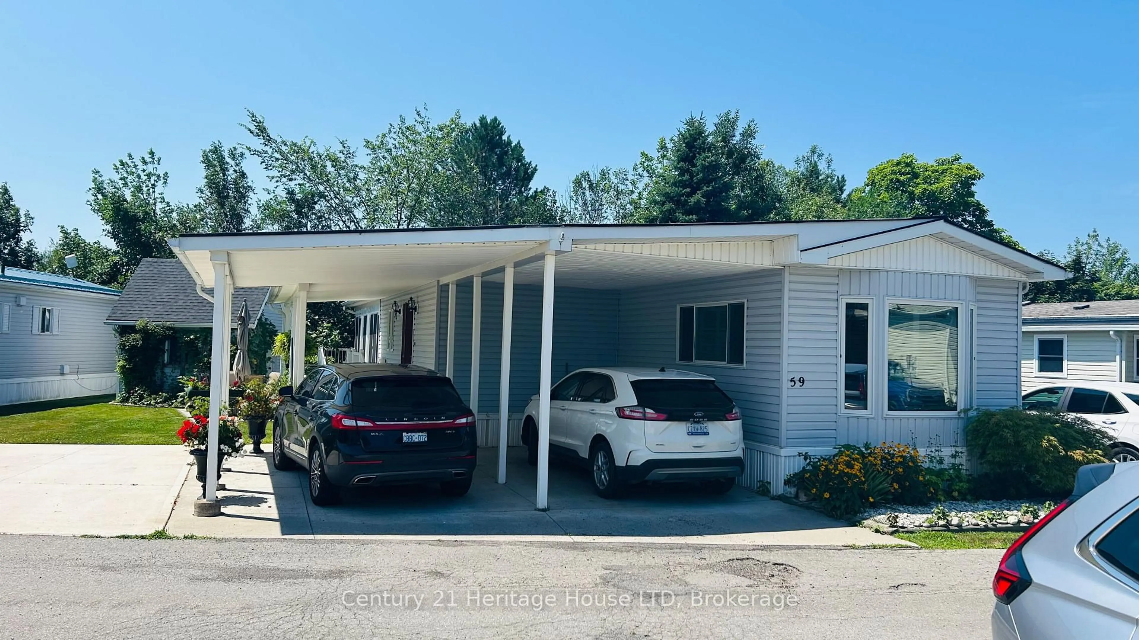 Home with vinyl exterior material, street for 3033 Townline Rd #59, Fort Erie Ontario L0S 1S1
