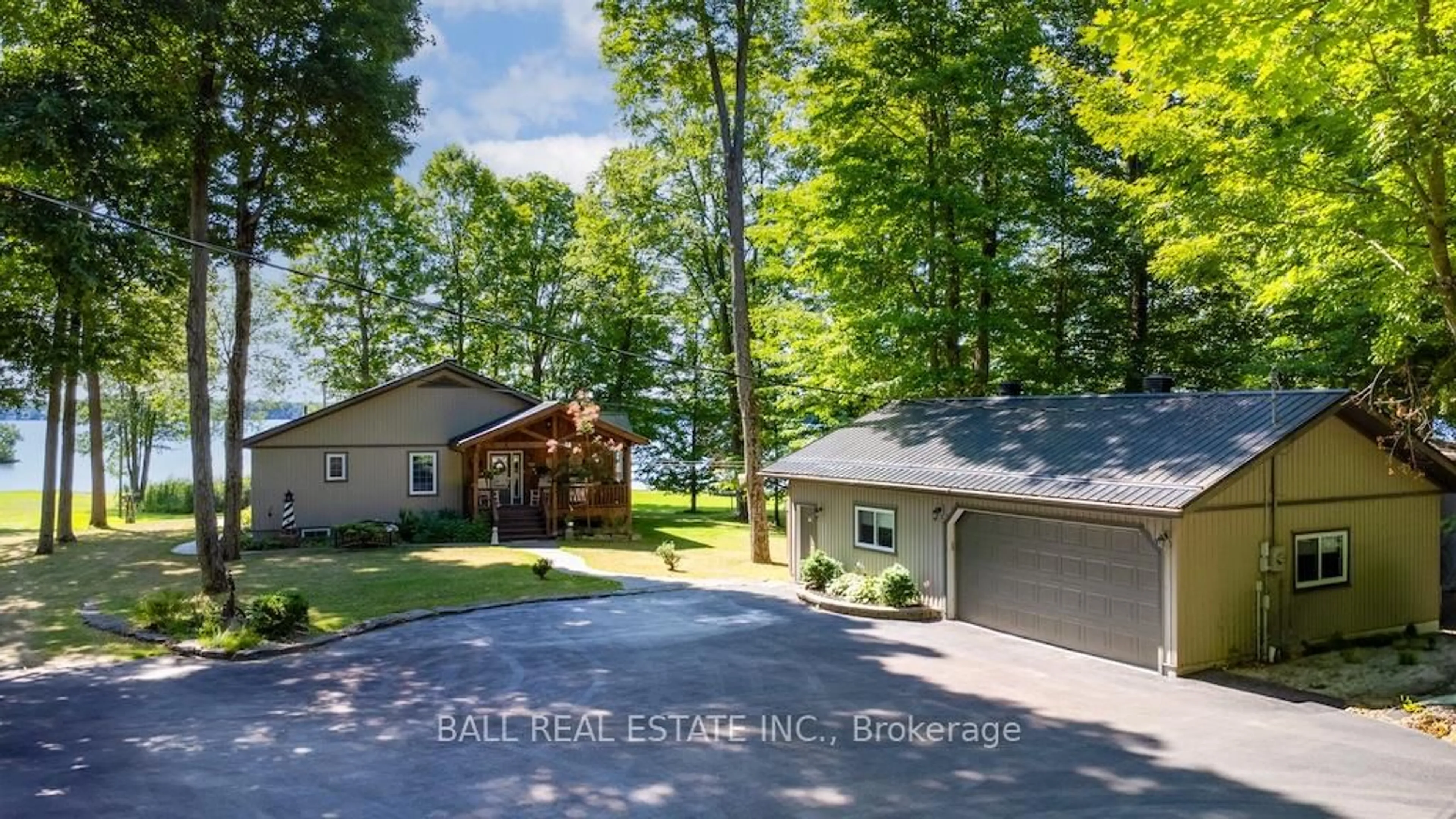 A pic from outside/outdoor area/front of a property/back of a property/a pic from drone, water/lake/river/ocean view for 919 Cook Rd, Limoges Ontario K0K 2M0