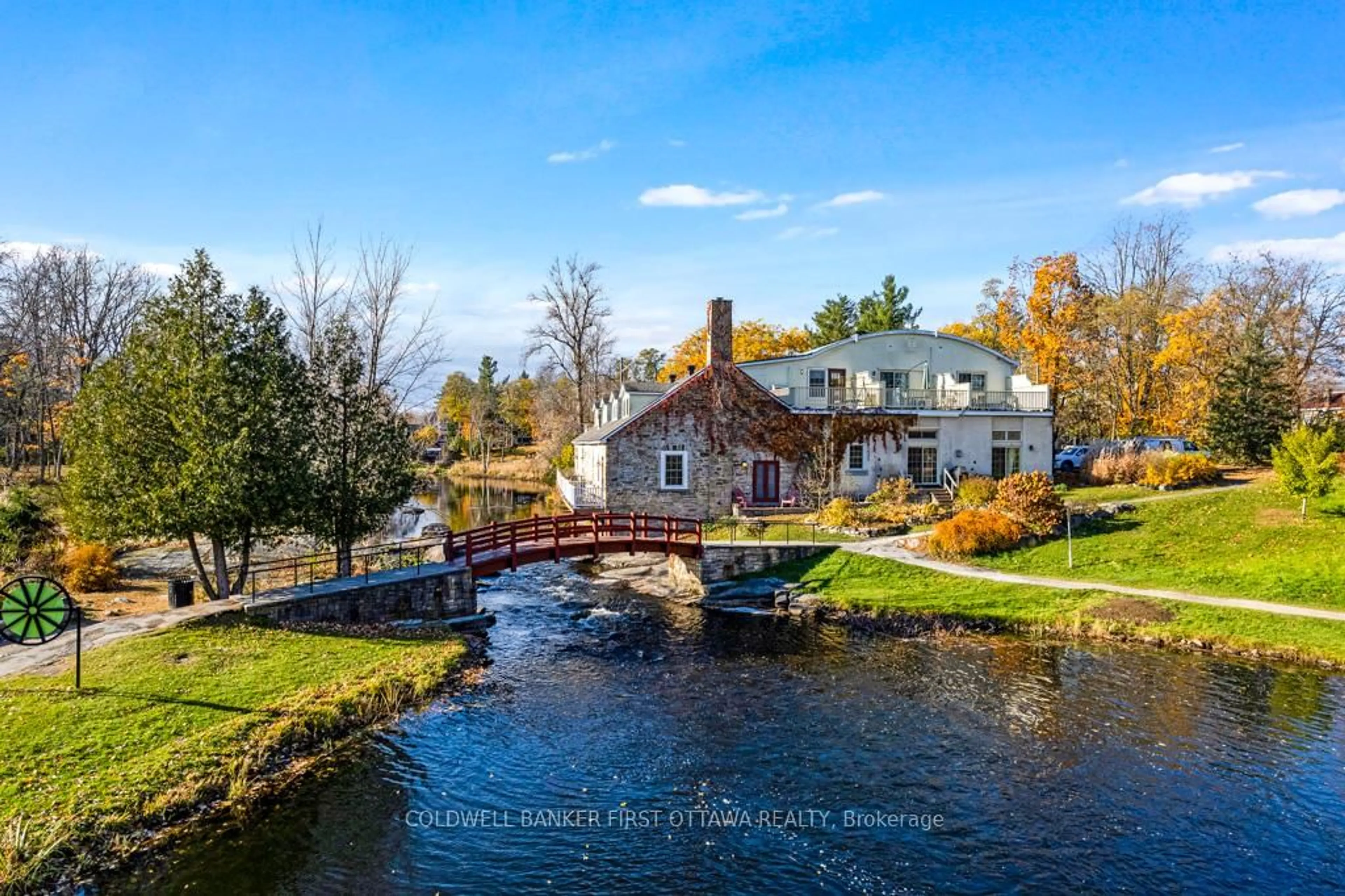 A pic from outside/outdoor area/front of a property/back of a property/a pic from drone, water/lake/river/ocean view for 5B LEWIS St, Perth Ontario K7H 1M6