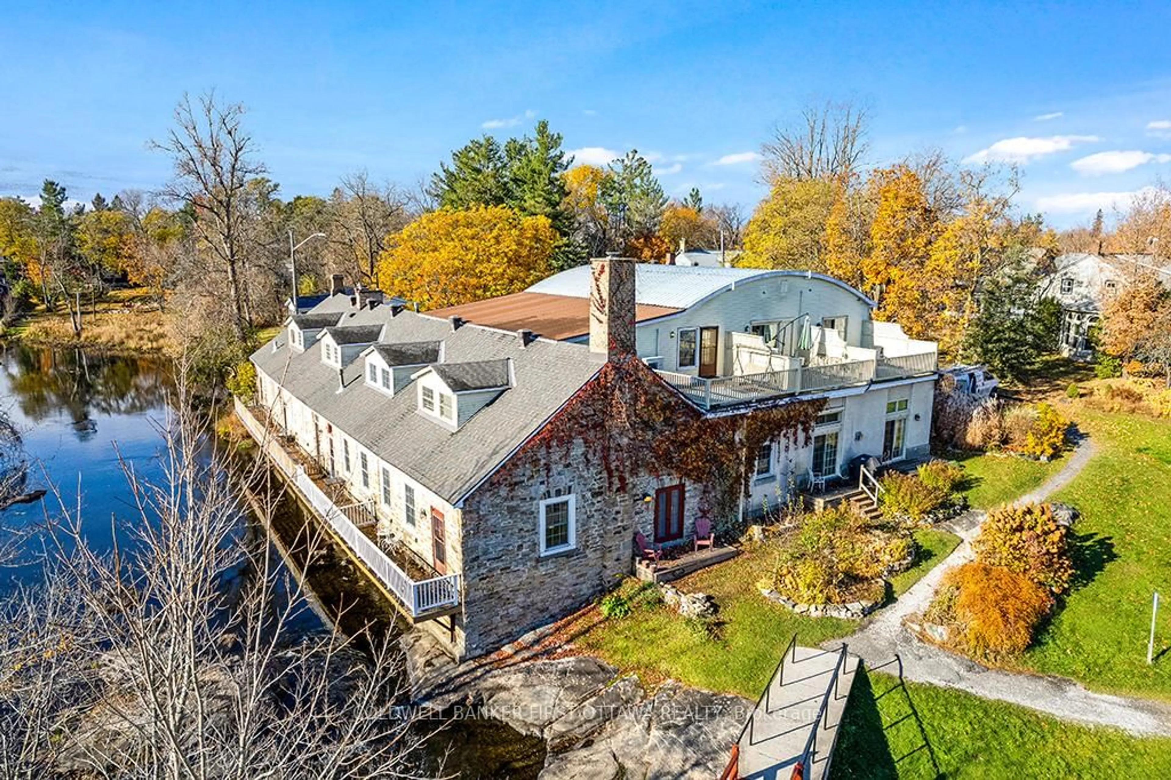 A pic from outside/outdoor area/front of a property/back of a property/a pic from drone, water/lake/river/ocean view for 5B LEWIS St, Perth Ontario K7H 1M6
