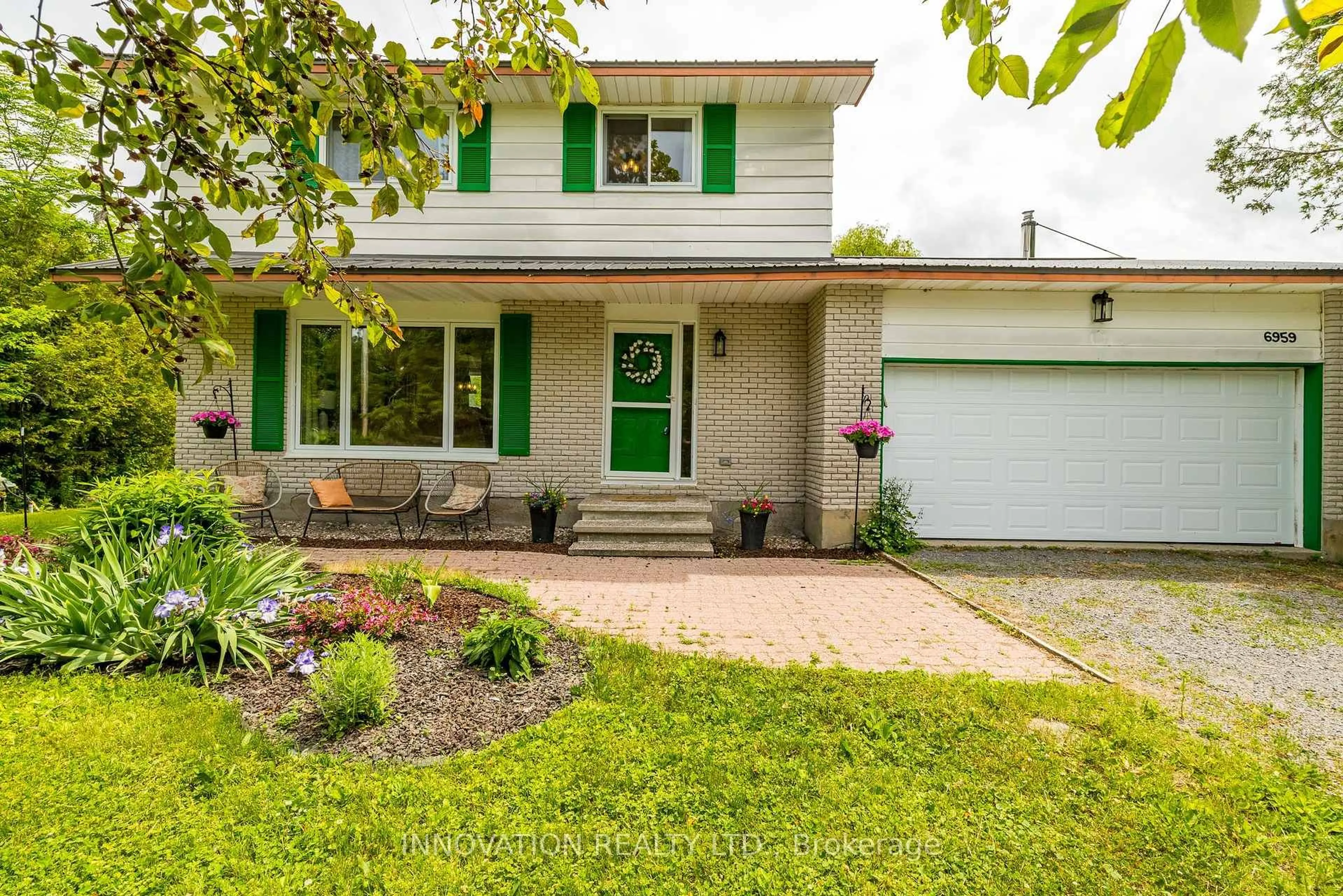 Home with vinyl exterior material, street for 6959 Gallagher Rd, North Gower Ontario K0A 2T0