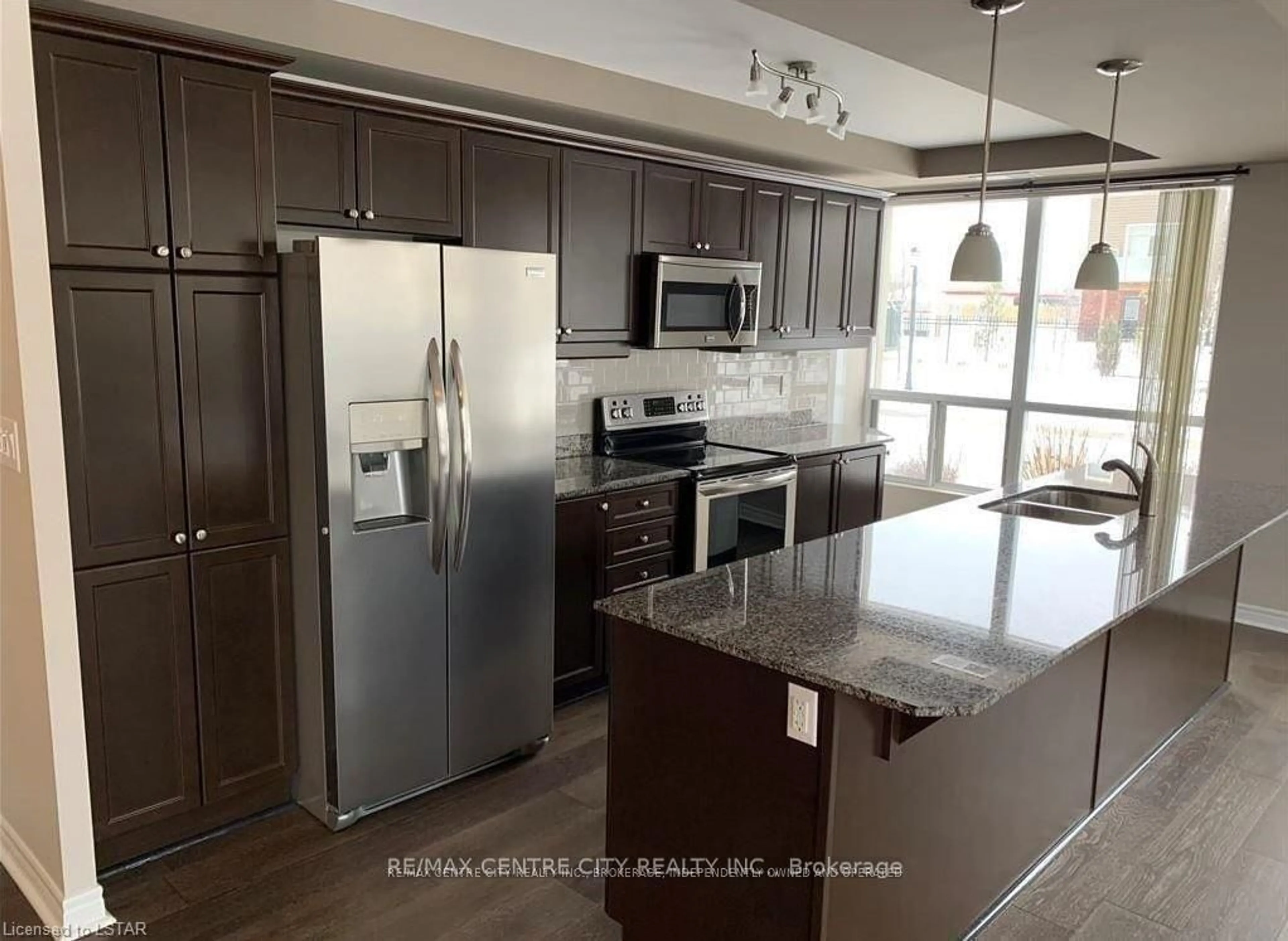 Open concept kitchen, ceramic/tile floor for 1030 Coronation Dr #103, London North Ontario N6G 0G5