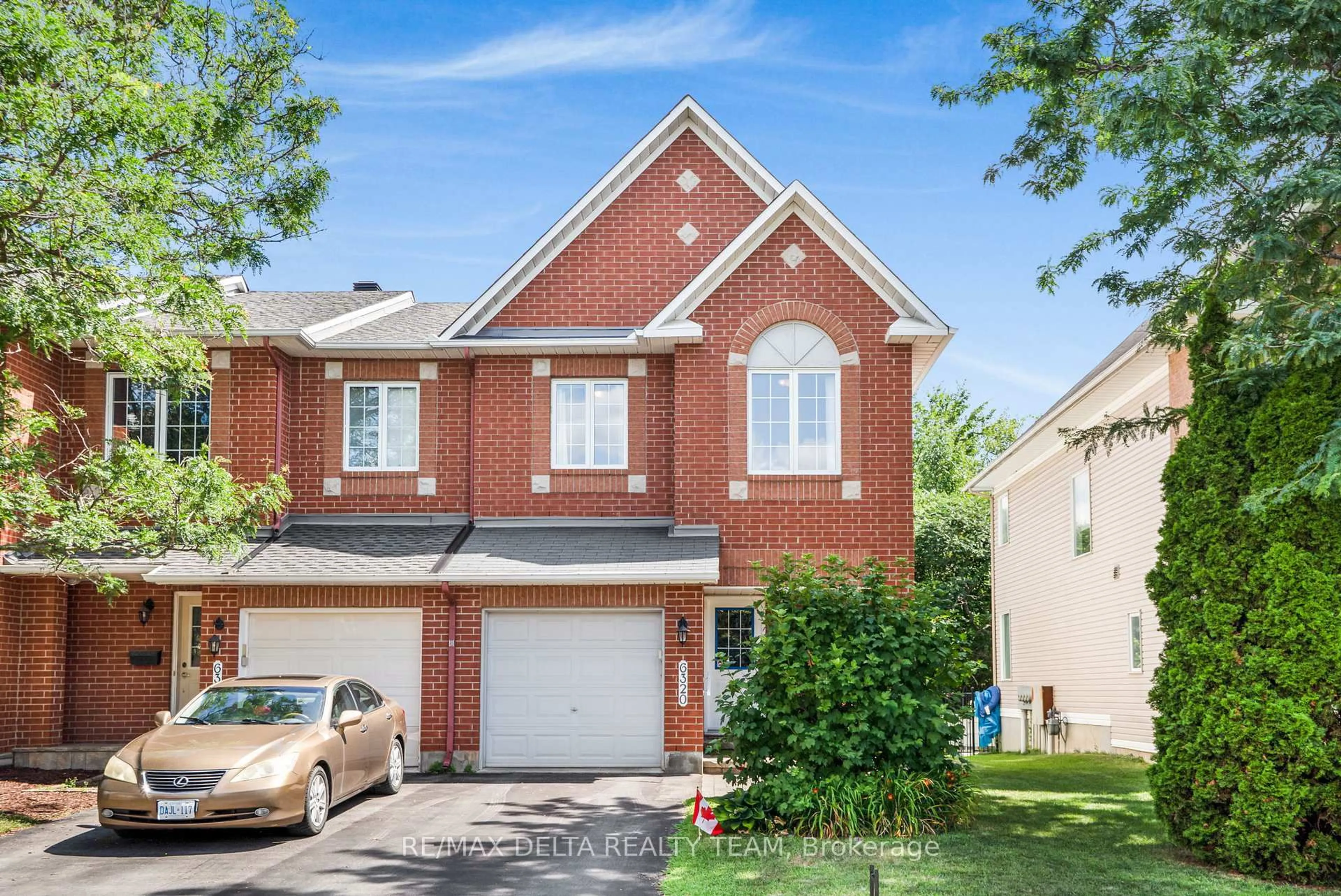 Home with brick exterior material, street for 6320 Sablewood Pl, Ottawa Ontario K1C 7M6