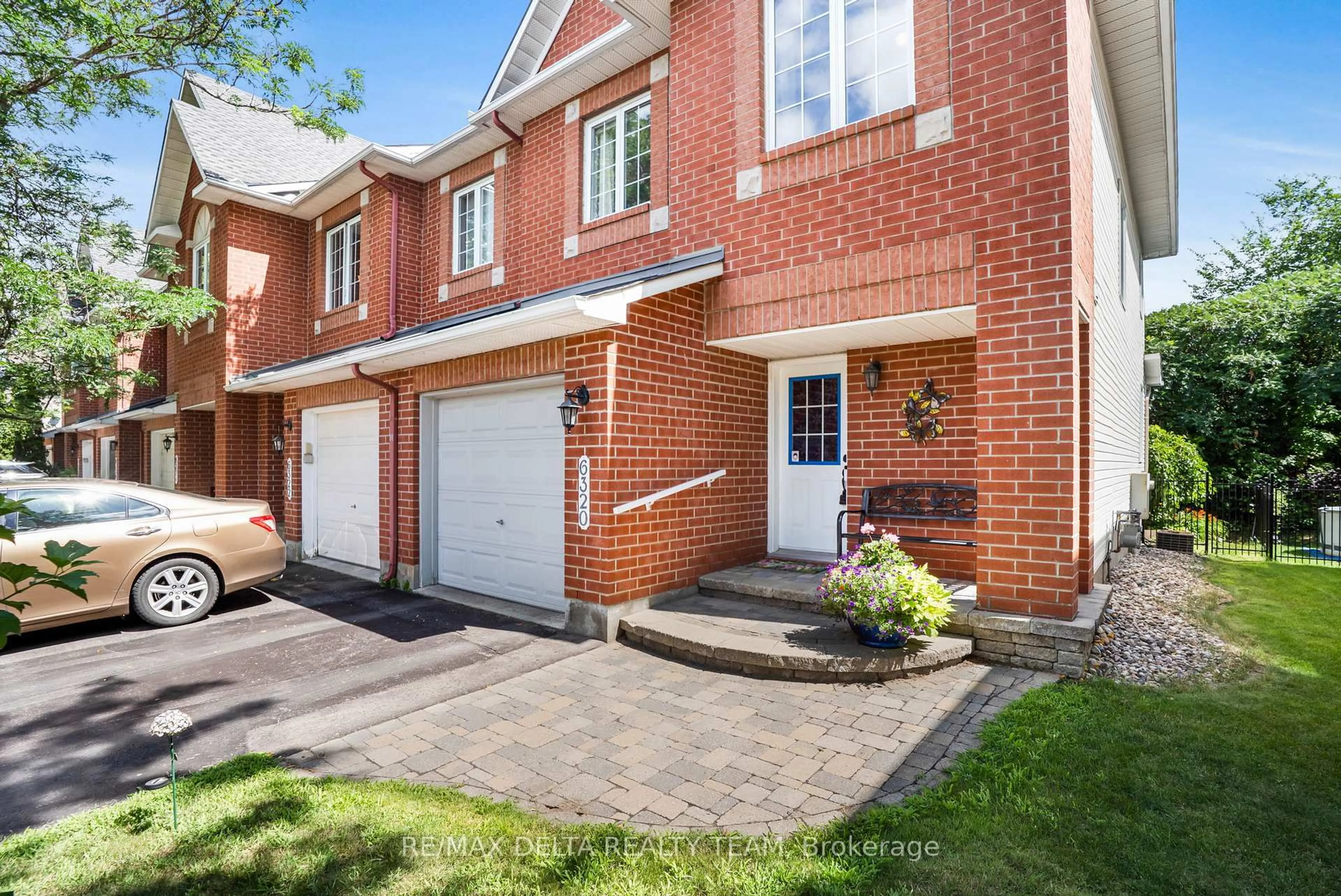 Home with brick exterior material, street for 6320 Sablewood Pl, Ottawa Ontario K1C 7M6