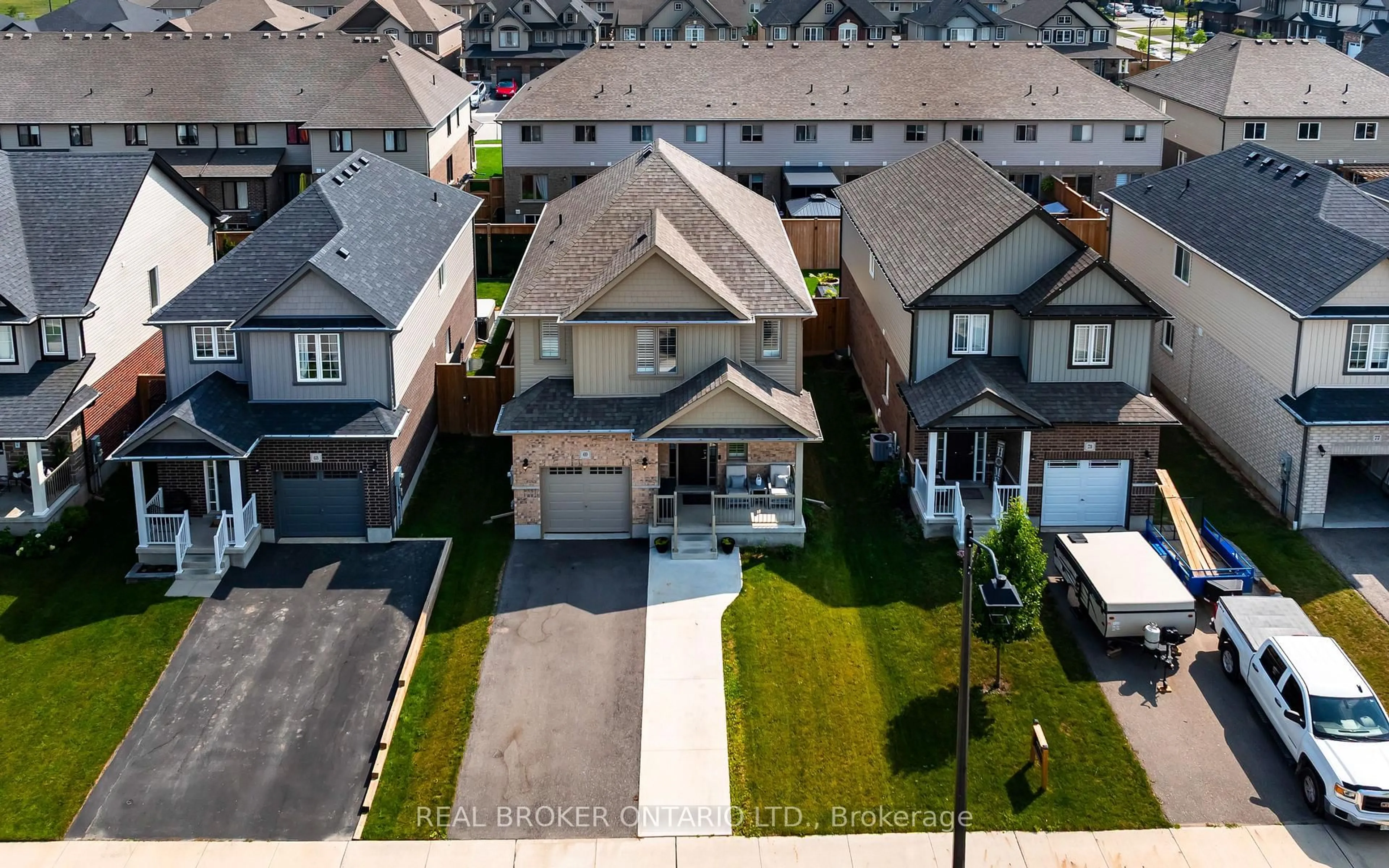 A pic from outside/outdoor area/front of a property/back of a property/a pic from drone, street for 69 Miranda Path, Woolwich Ontario N3B 2C6