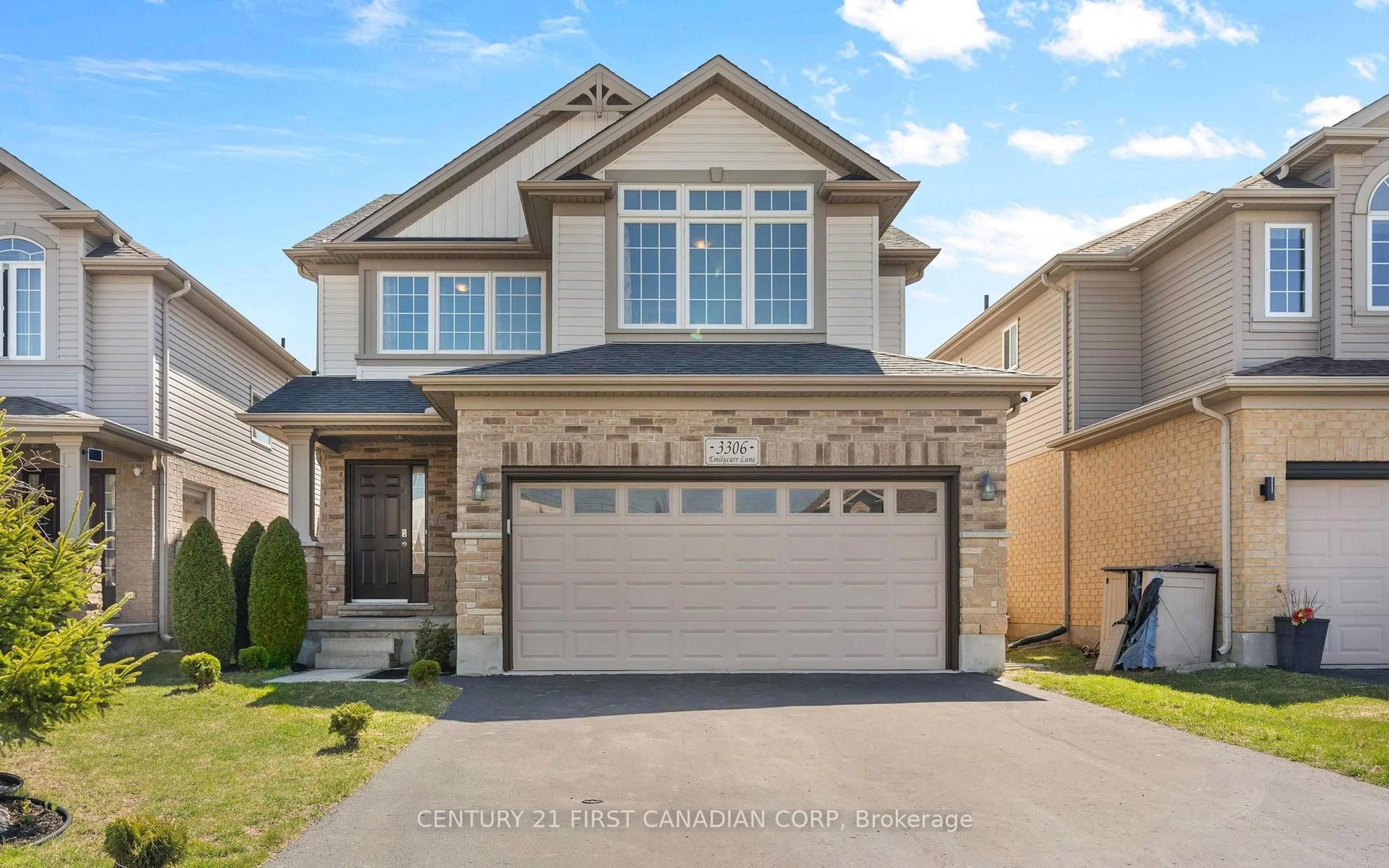 Home with vinyl exterior material, street for 3306 Emilycarr Lane, London South Ontario N6L 0B3