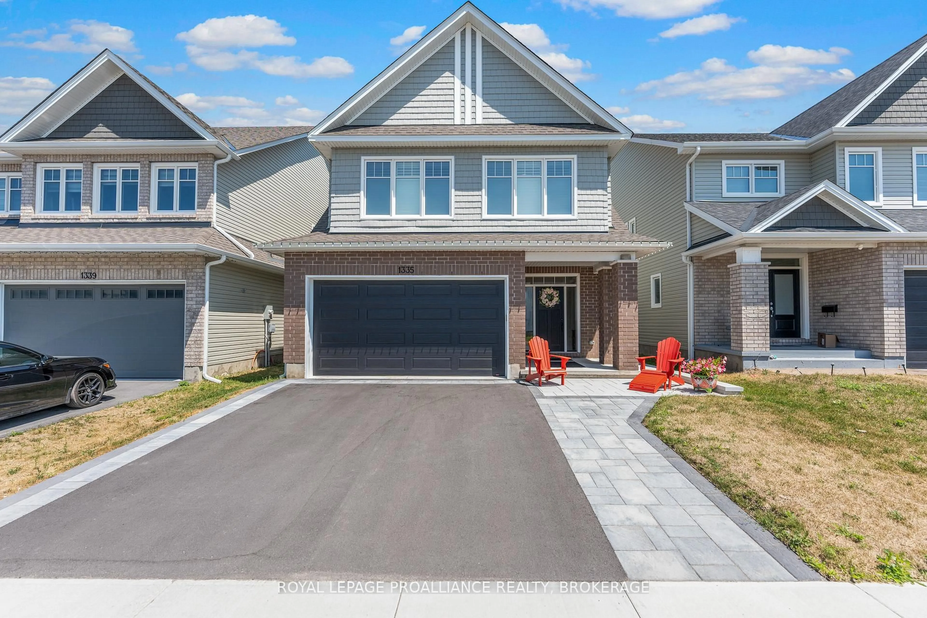 Home with vinyl exterior material, street for 1335 Grayson Dr, Kingston Ontario K7M 0H3