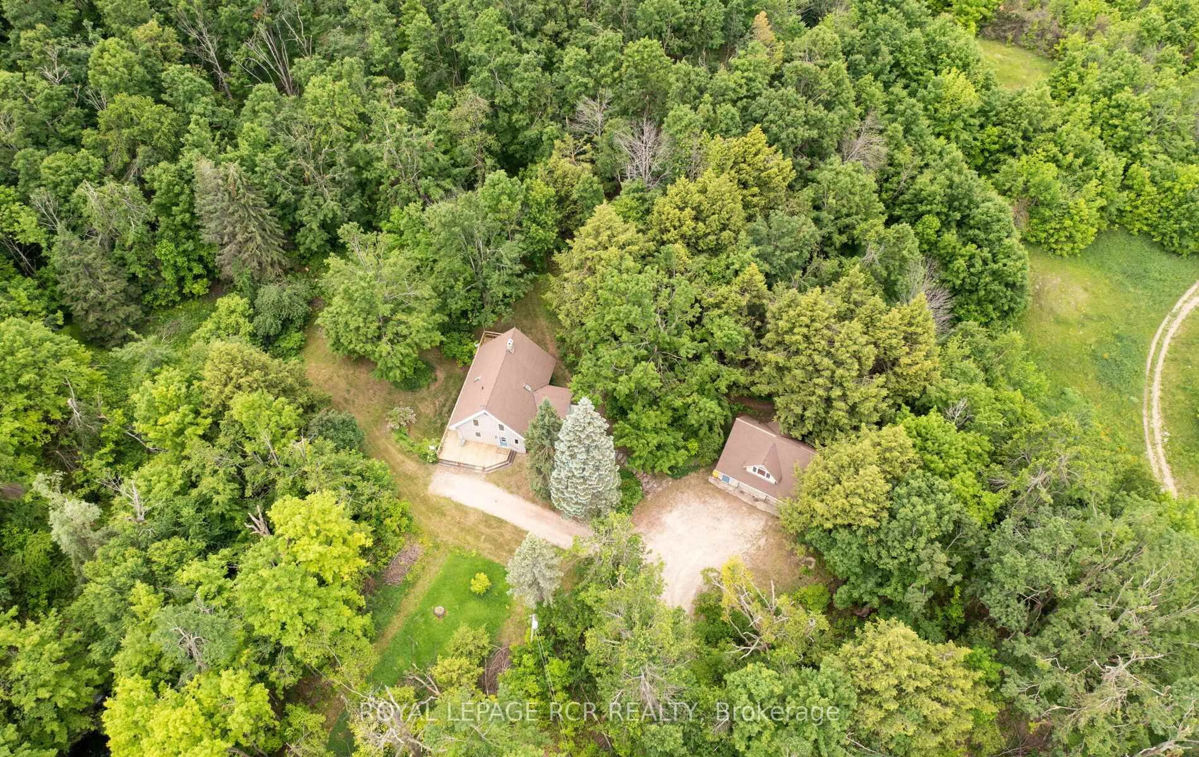 A pic from outside/outdoor area/front of a property/back of a property/a pic from drone, forest/trees view for 757186 2nd Line, Mulmur Ontario L9V 0G7