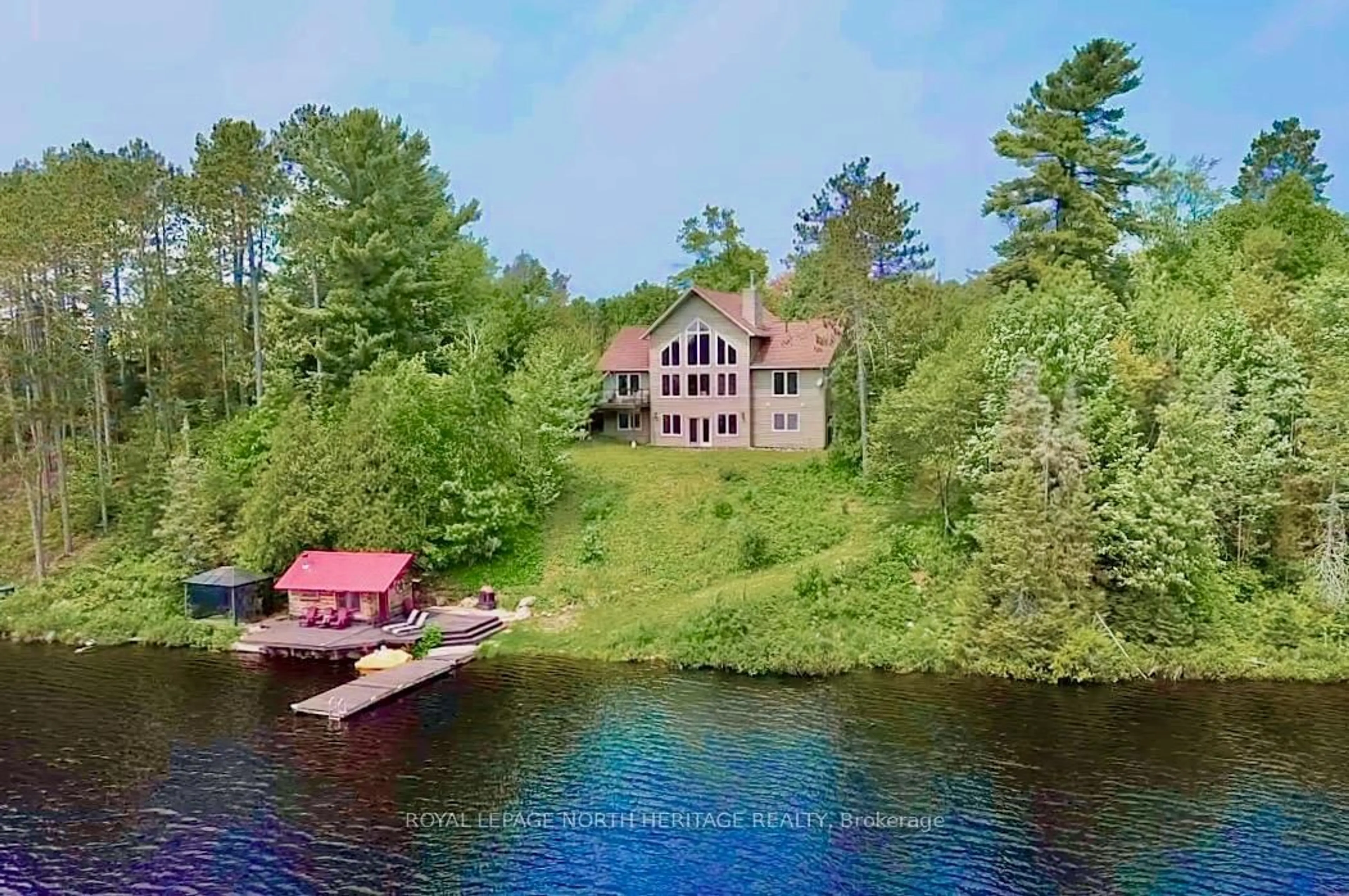 A pic from outside/outdoor area/front of a property/back of a property/a pic from drone, water/lake/river/ocean view for 1427 Fairbanks Rd, Greater Sudbury Ontario P0M 2E0
