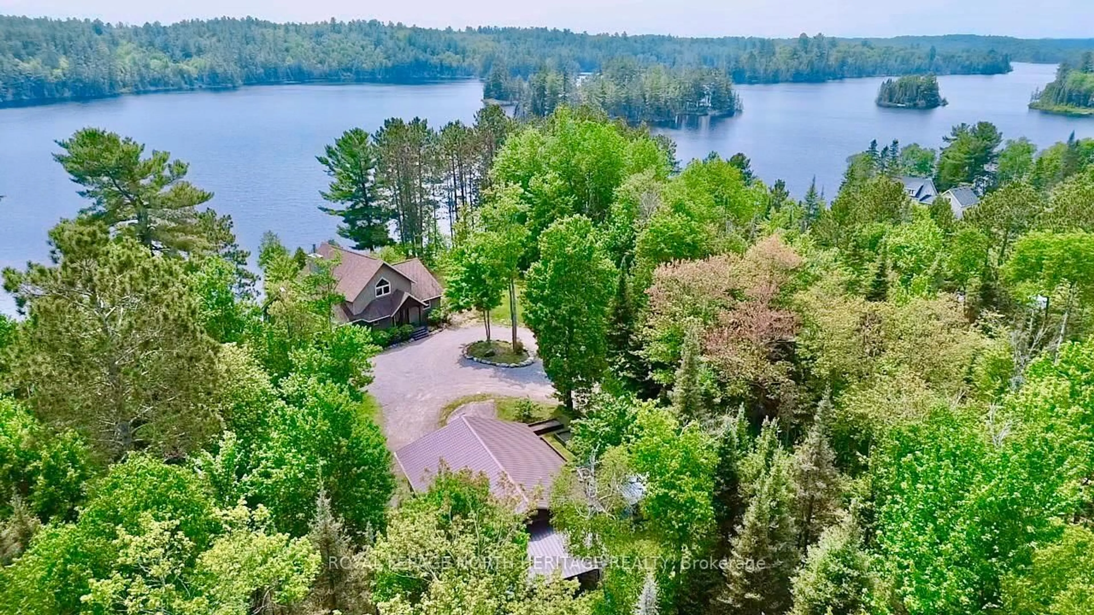 A pic from outside/outdoor area/front of a property/back of a property/a pic from drone, water/lake/river/ocean view for 1427 Fairbanks Rd, Greater Sudbury Ontario P0M 2E0