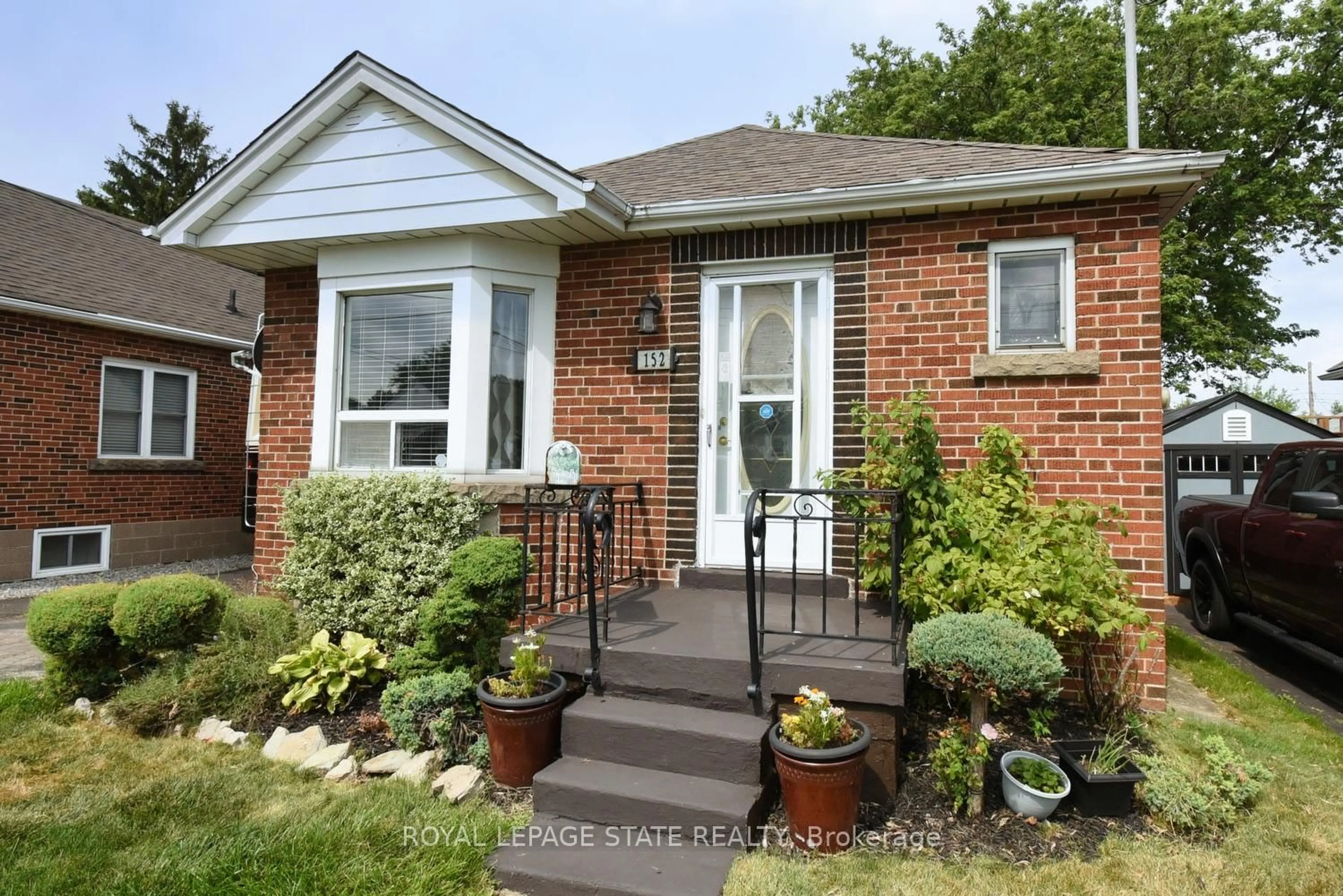 Home with brick exterior material, street for 152 Glencairn Ave, Hamilton Ontario L8K 3N9