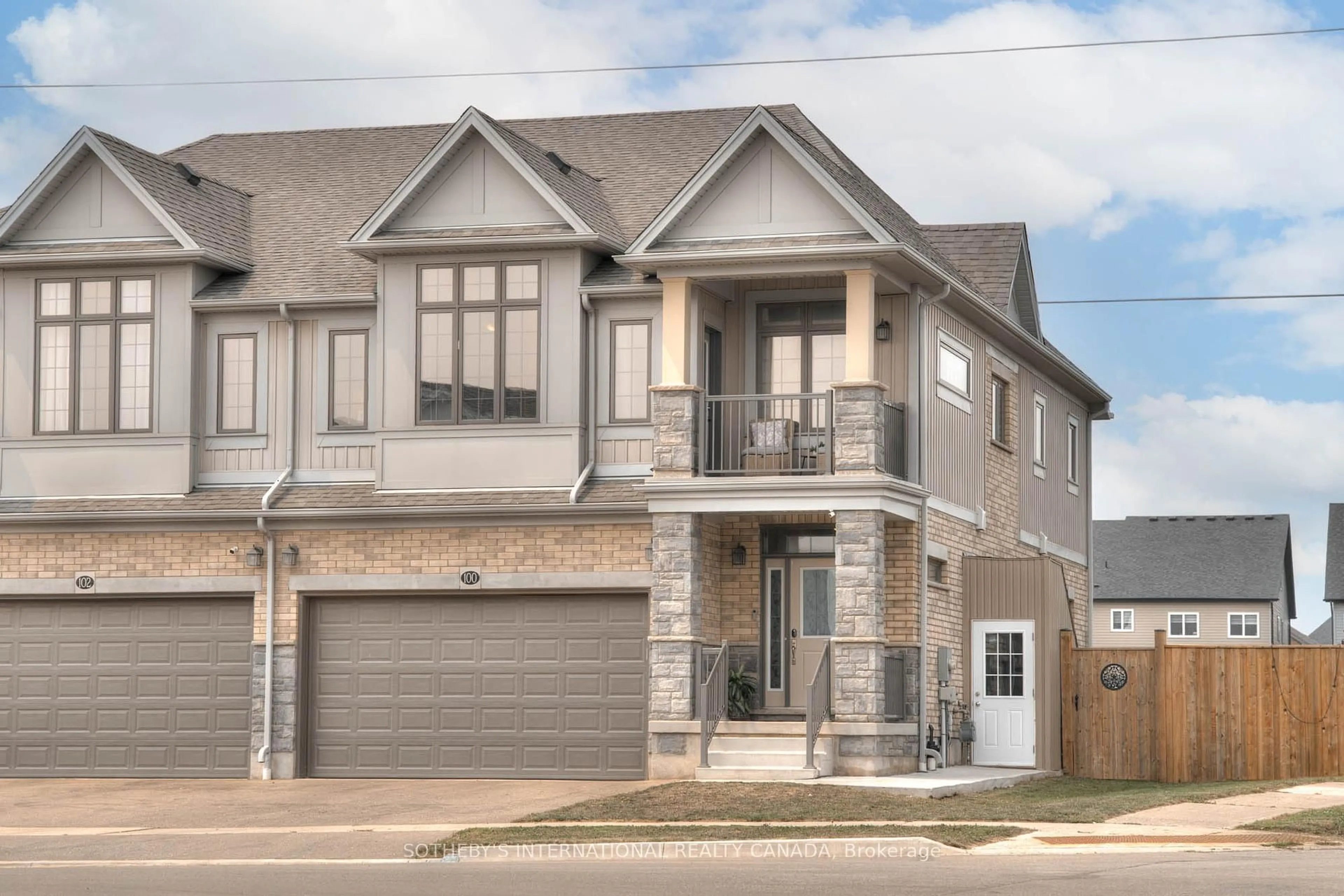 Home with brick exterior material, street for 100 Foamflower Pl, Waterloo Ontario N2V 0G9