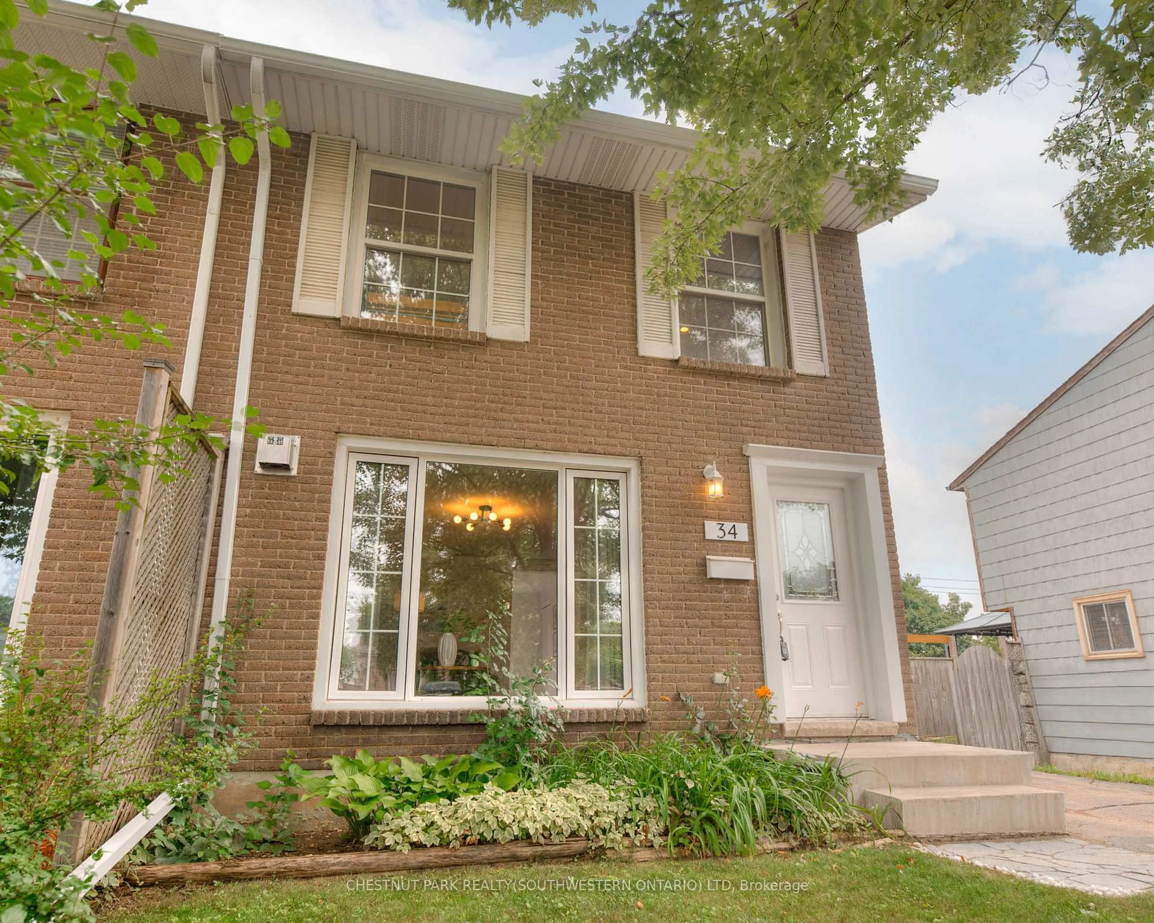 Home with brick exterior material, street for 34 Monteagle Cres, Kitchener Ontario N2N 1N1