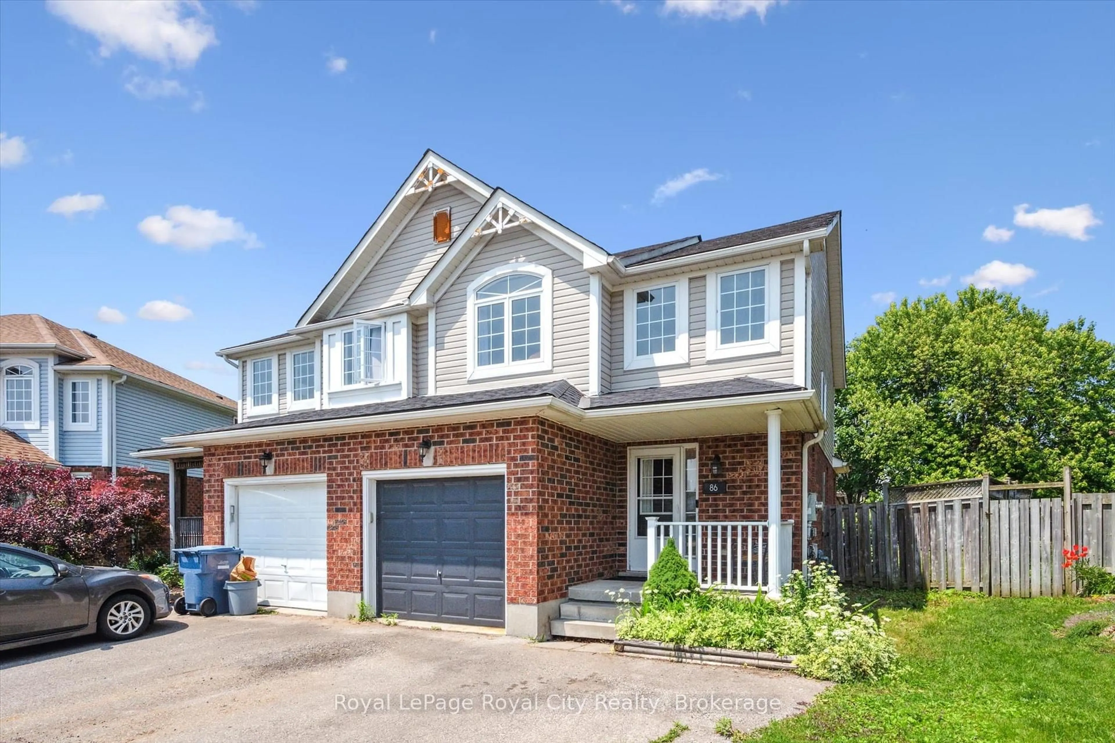 Home with brick exterior material, street for 86 Swift Cres, Guelph Ontario N1E 7J1