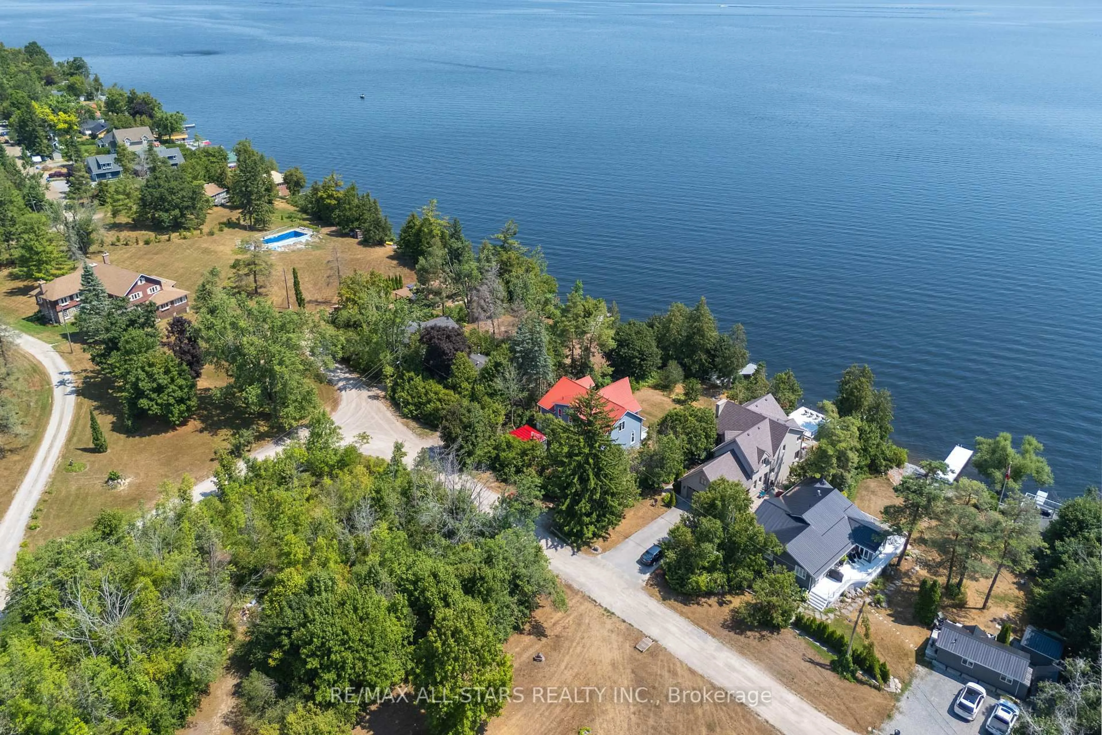 A pic from outside/outdoor area/front of a property/back of a property/a pic from drone, water/lake/river/ocean view for 9 Briar St, Kawartha Lakes Ontario K0M 1G0