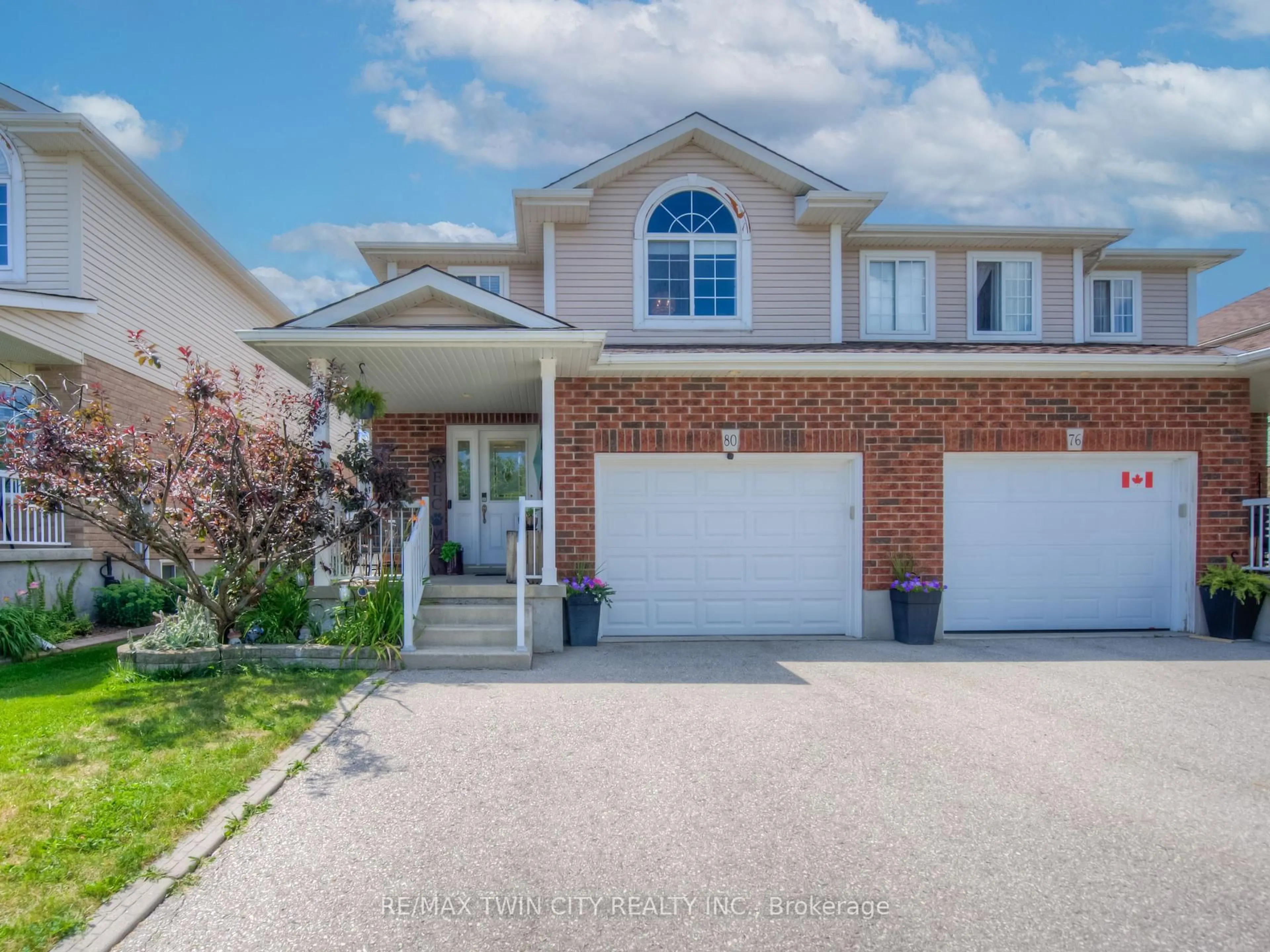 Home with vinyl exterior material, street for 80 Raising Mill Gate, Woolwich Ontario N3B 3N5