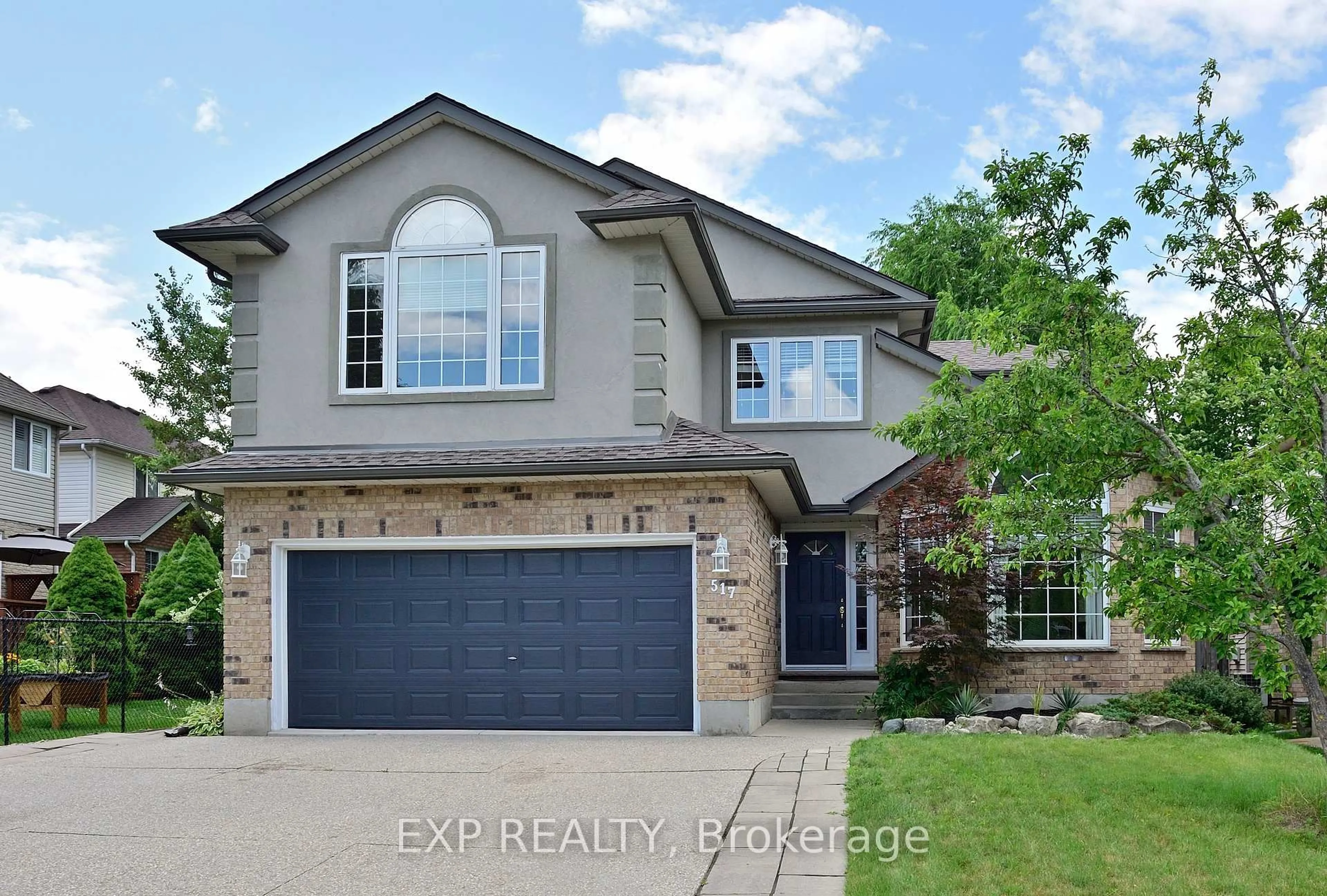 Home with brick exterior material, street for 517 Buckingham Blvd, Waterloo Ontario N2T 2T9