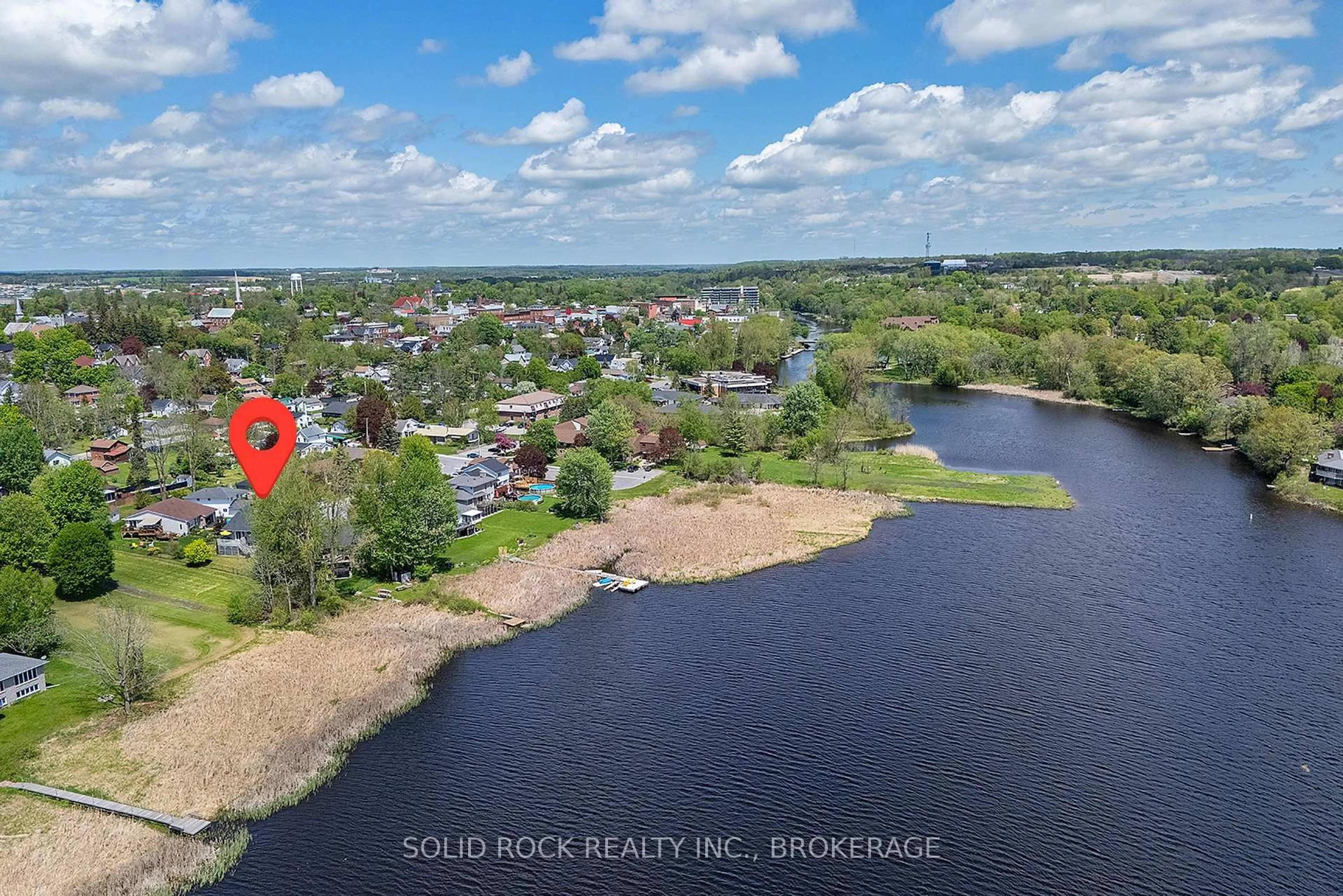 A pic from outside/outdoor area/front of a property/back of a property/a pic from drone, water/lake/river/ocean view for 150 Shoreline Cres, Greater Napanee Ontario K7R 3W2