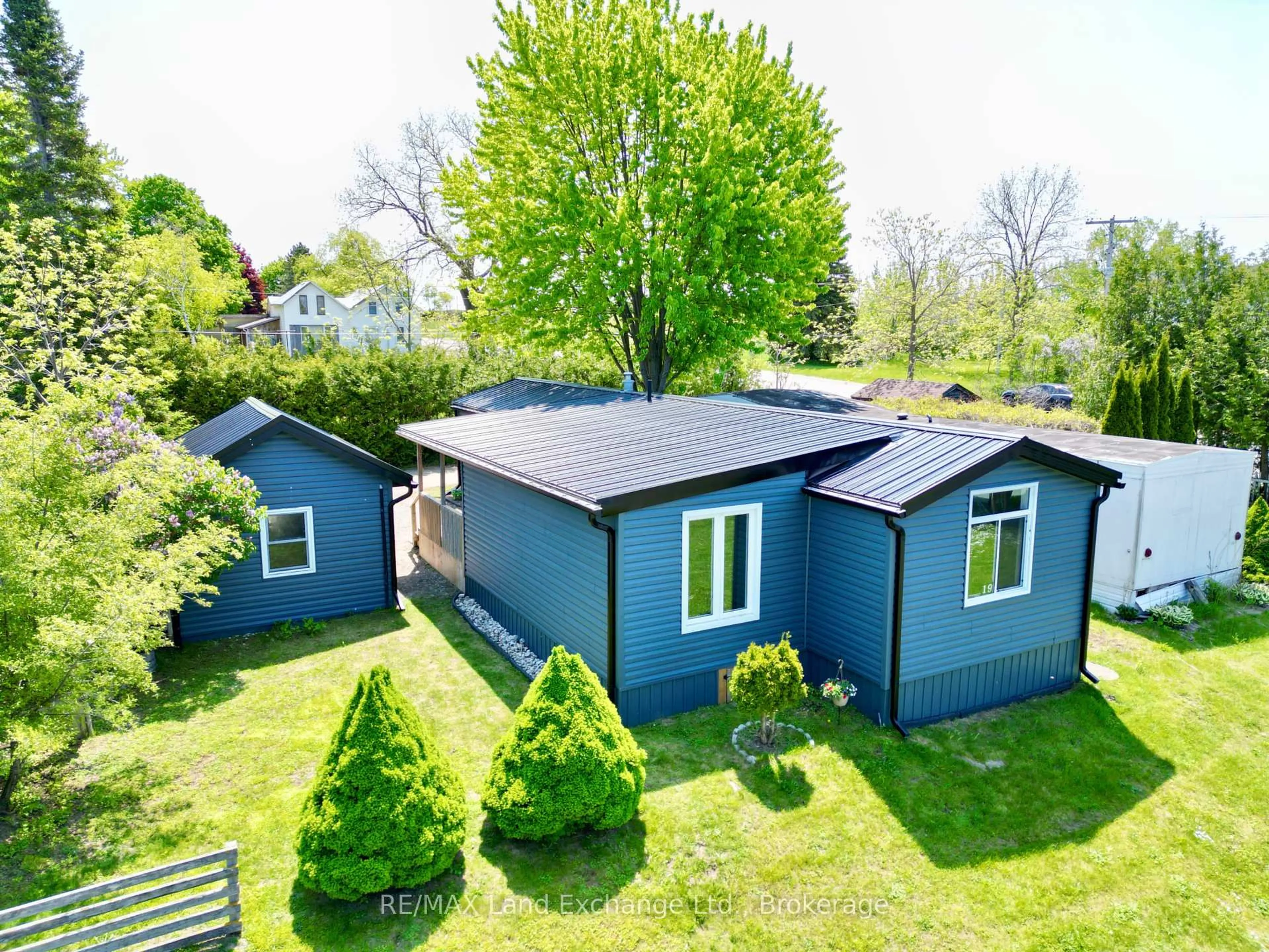 A pic from outside/outdoor area/front of a property/back of a property/a pic from drone, unknown for 332-19 Concession 6 Rd, Saugeen Shores Ontario N0H 2C7