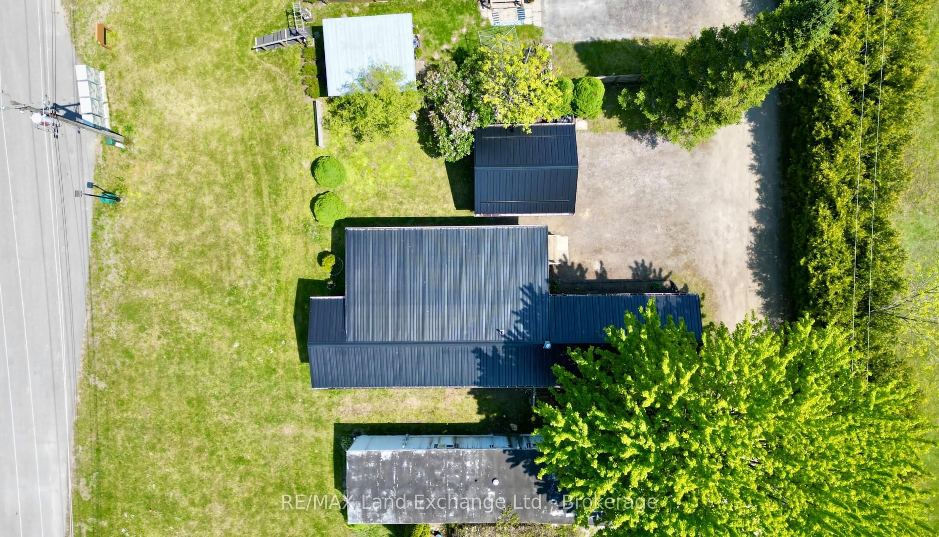 A pic from outside/outdoor area/front of a property/back of a property/a pic from drone, street for 332-19 Concession 6 Rd, Saugeen Shores Ontario N0H 2C7