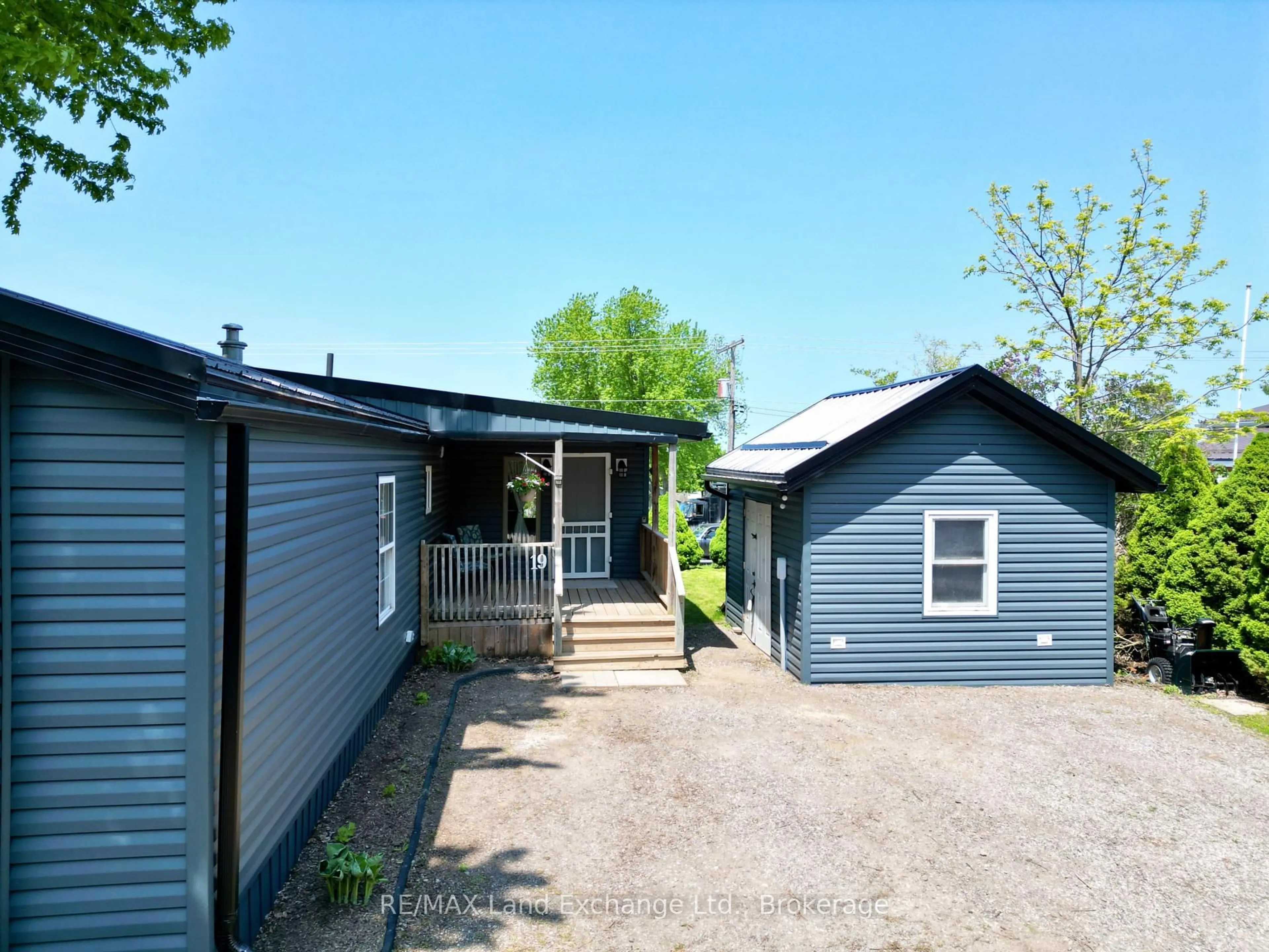 Home with vinyl exterior material, street for 332-19 Concession 6 Rd, Saugeen Shores Ontario N0H 2C7