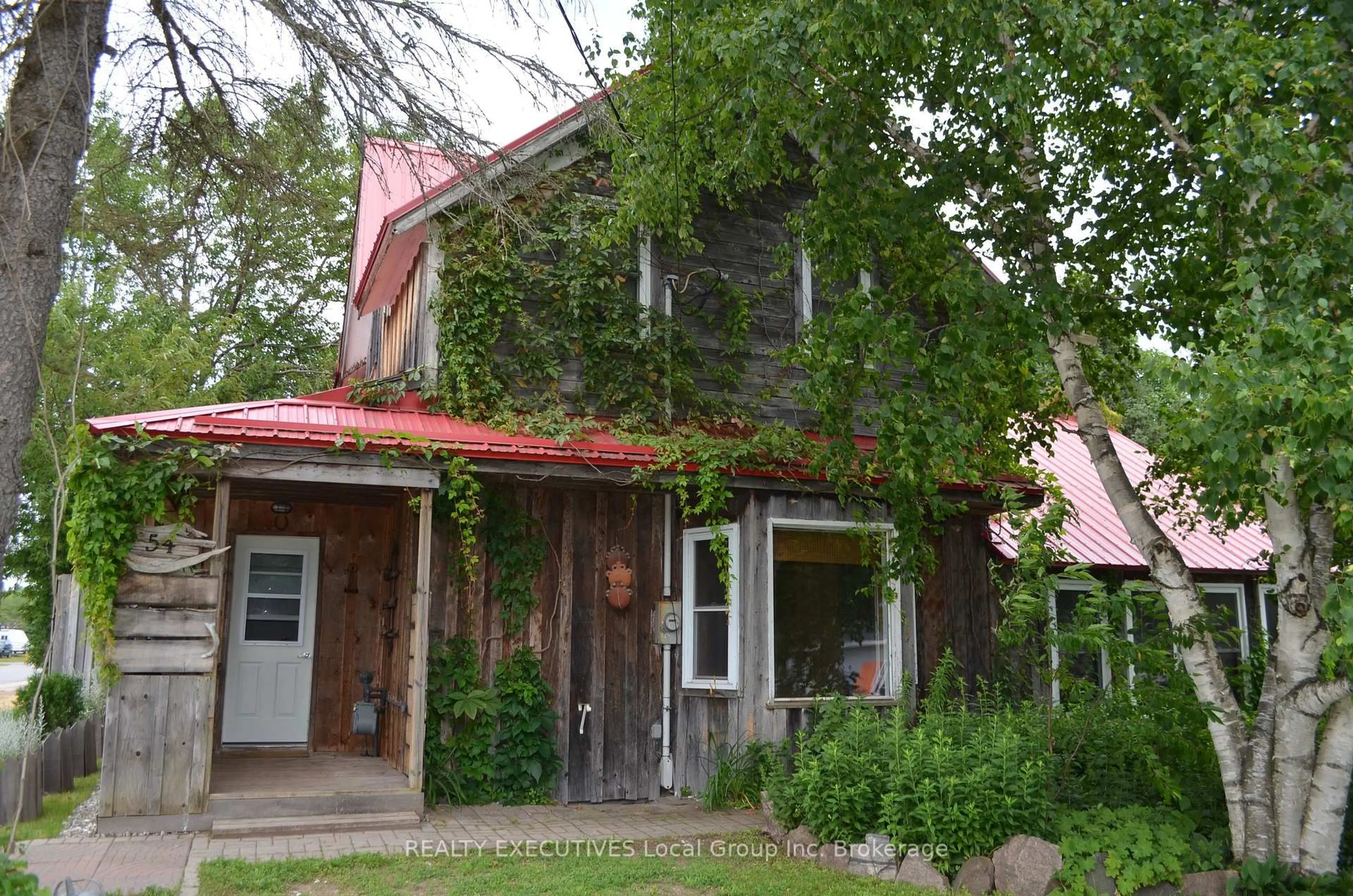 Home with brick exterior material, building for 54 Riverside Ave, South River Ontario P0A 1X0