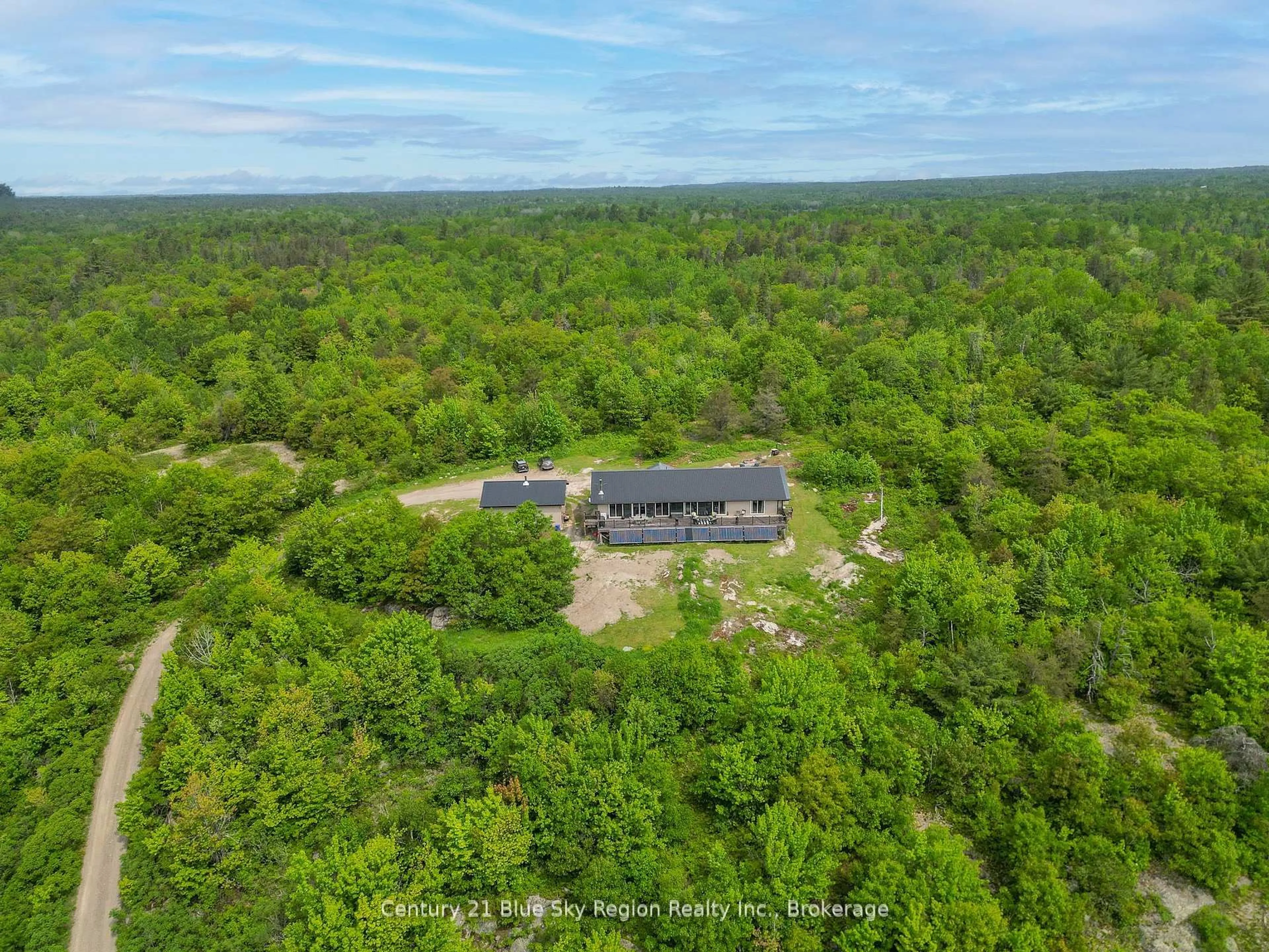 A pic from outside/outdoor area/front of a property/back of a property/a pic from drone, forest/trees view for 11327 Highway 17, West Nipissing Ontario P0H 1G0