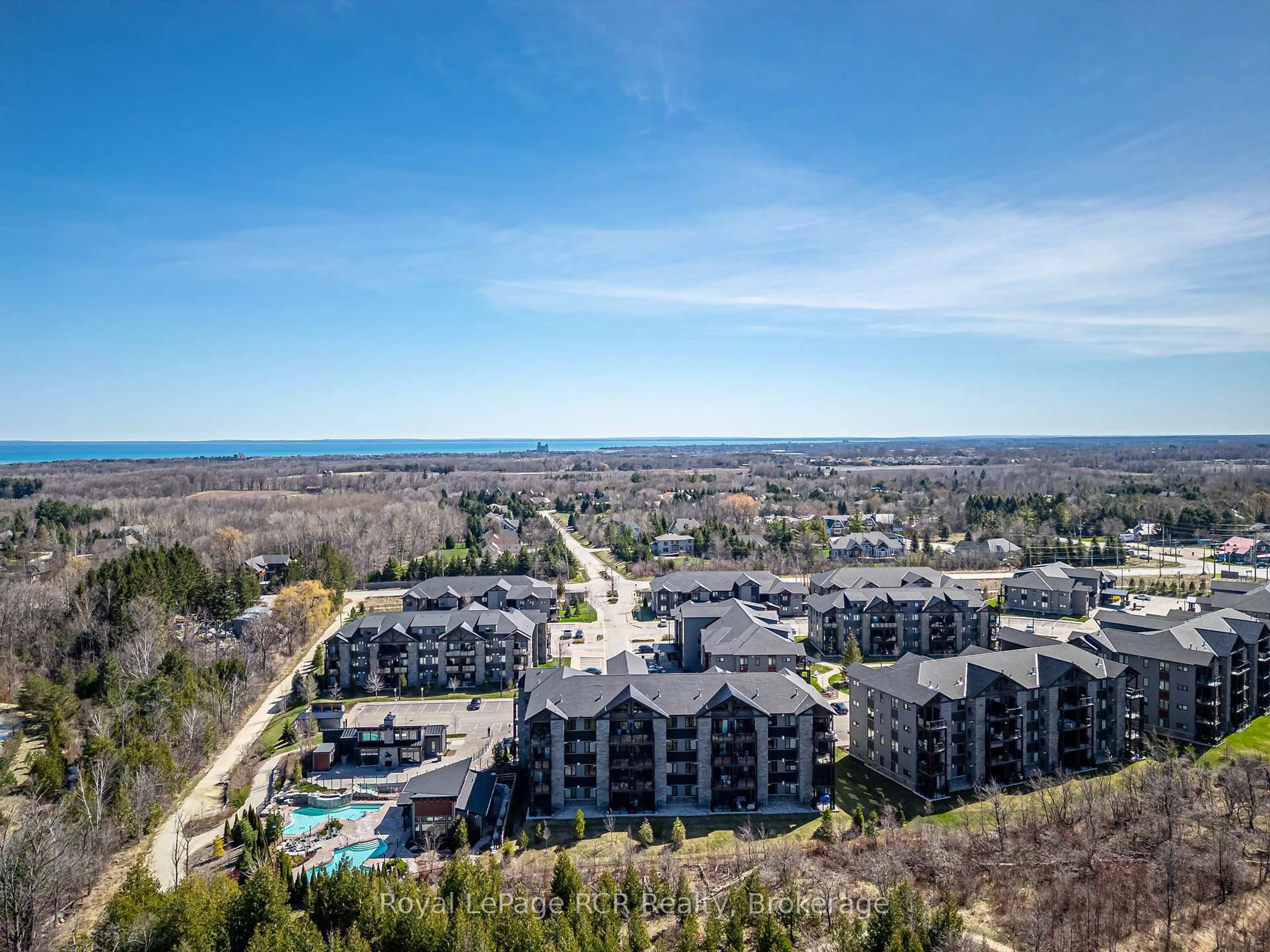 A pic from outside/outdoor area/front of a property/back of a property/a pic from drone, water/lake/river/ocean view for 11 Beckwith Lane #102, Blue Mountains Ontario L9Y 0C7
