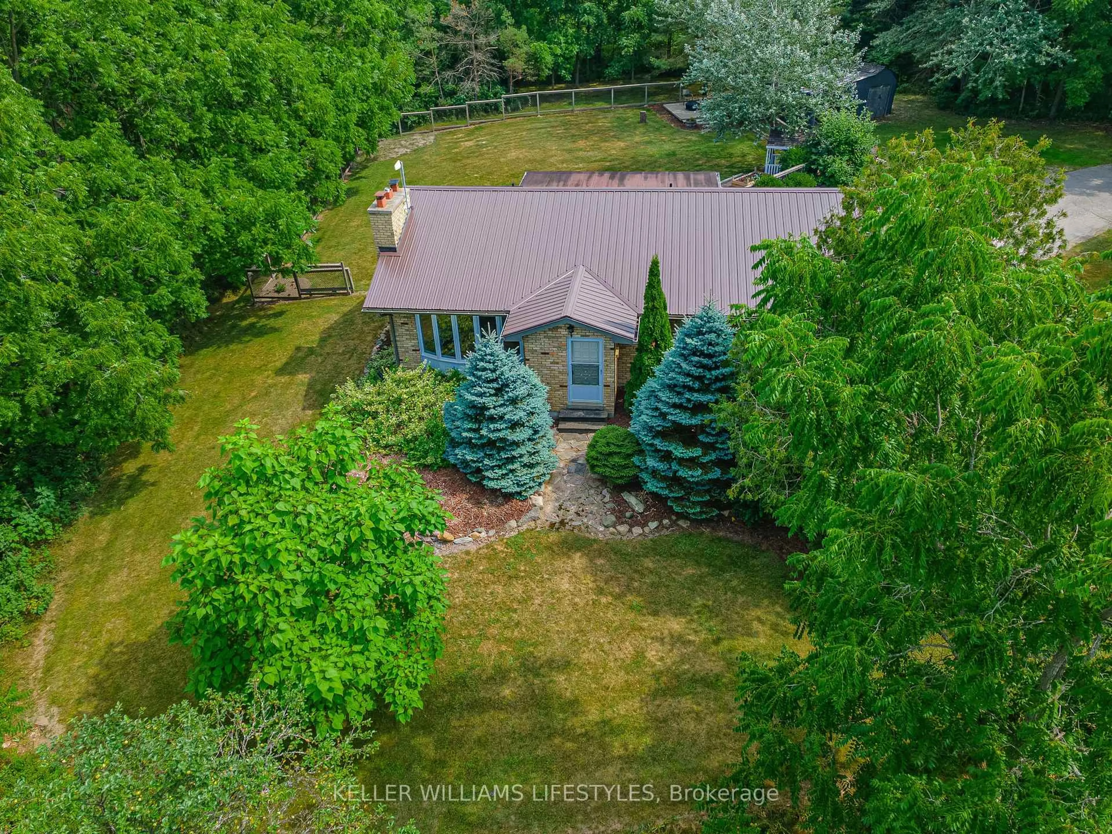 A pic from outside/outdoor area/front of a property/back of a property/a pic from drone, water/lake/river/ocean view for 11215 Petty St, North Middlesex Ontario N0M 1A0
