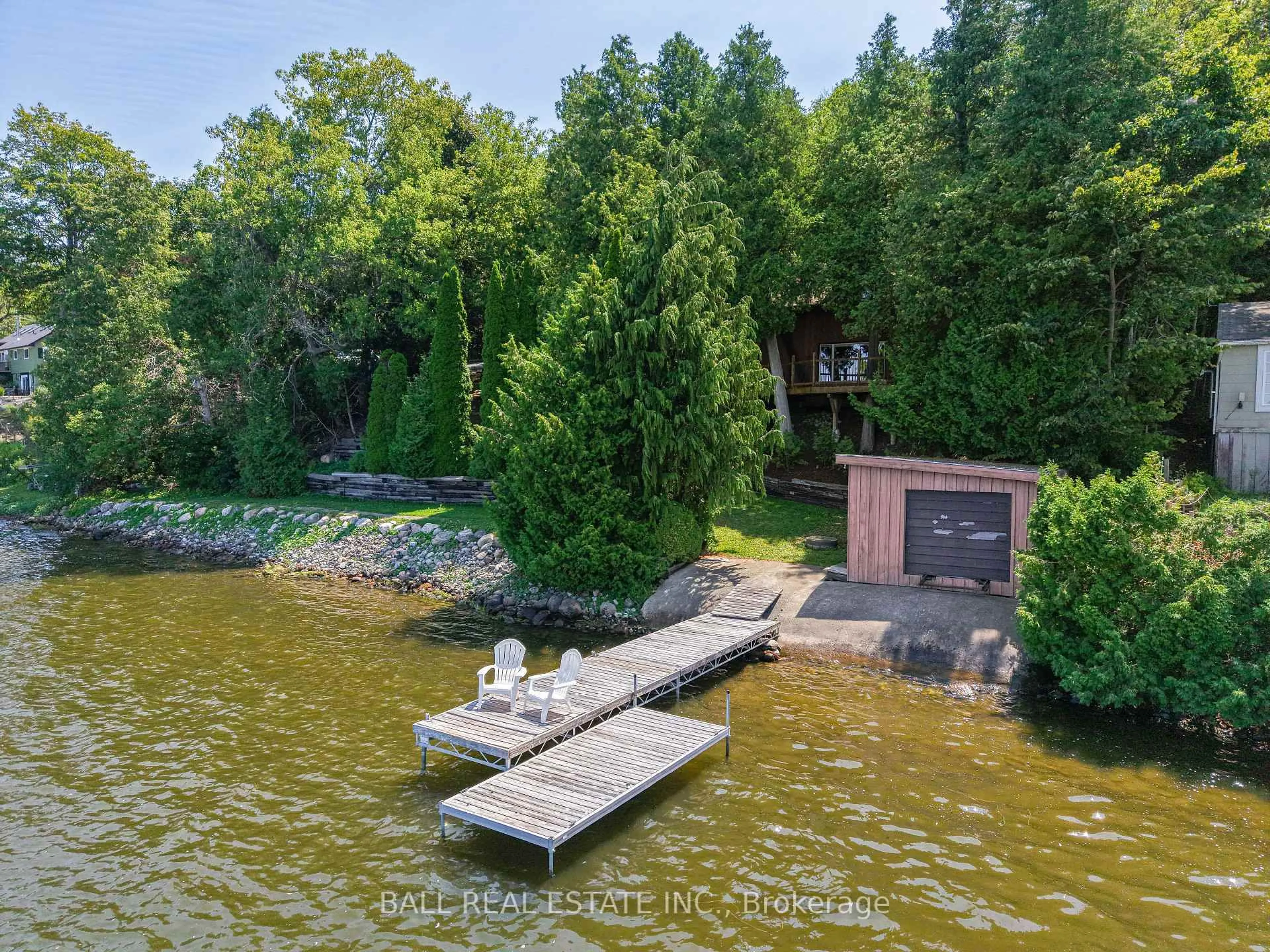 A pic from outside/outdoor area/front of a property/back of a property/a pic from drone, water/lake/river/ocean view for 8018 Taits Beach Rd #240, Hamilton Township Ontario K0L 1E0