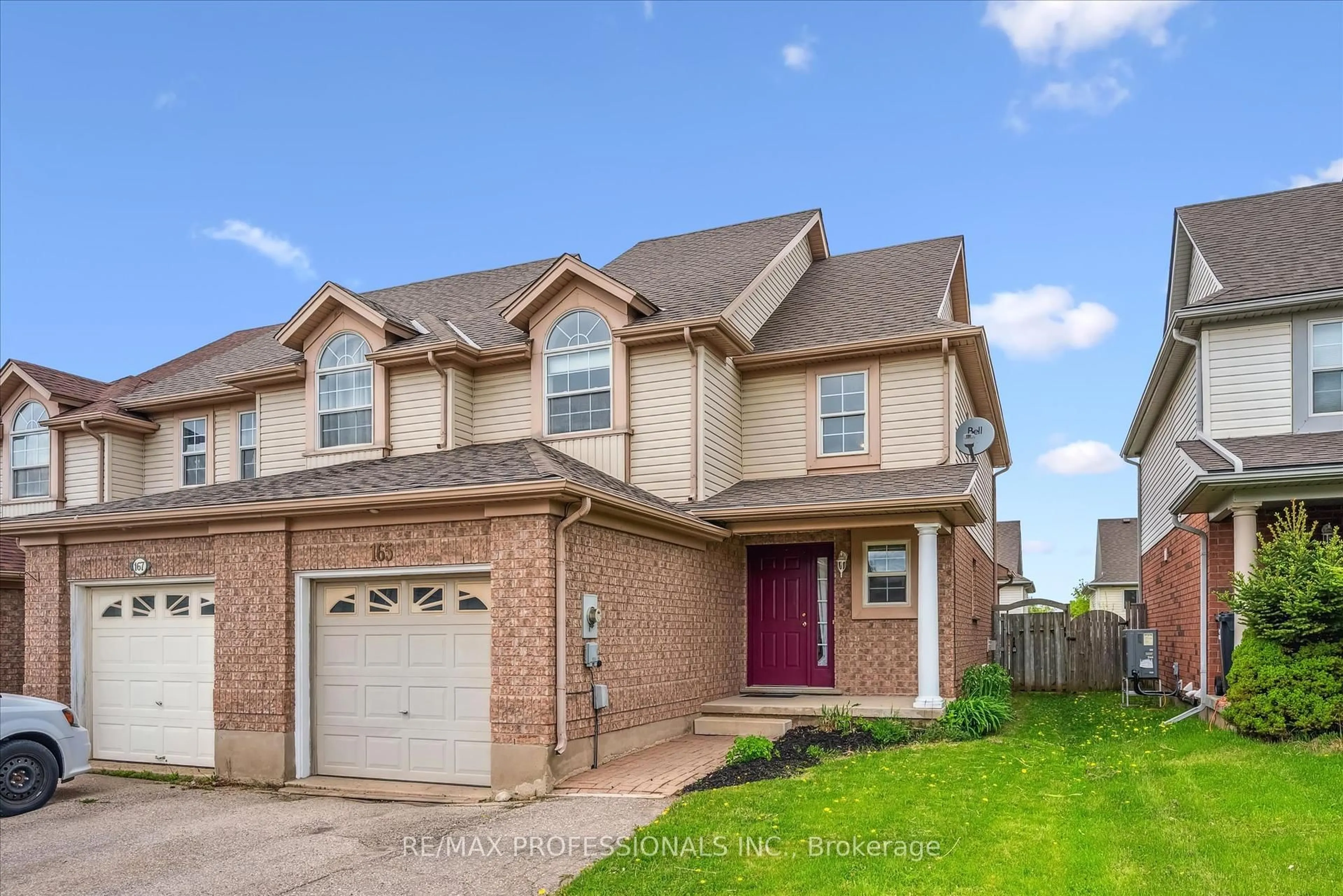 Home with brick exterior material, street for 165 Silurian Dr, Guelph Ontario N1E 7E6