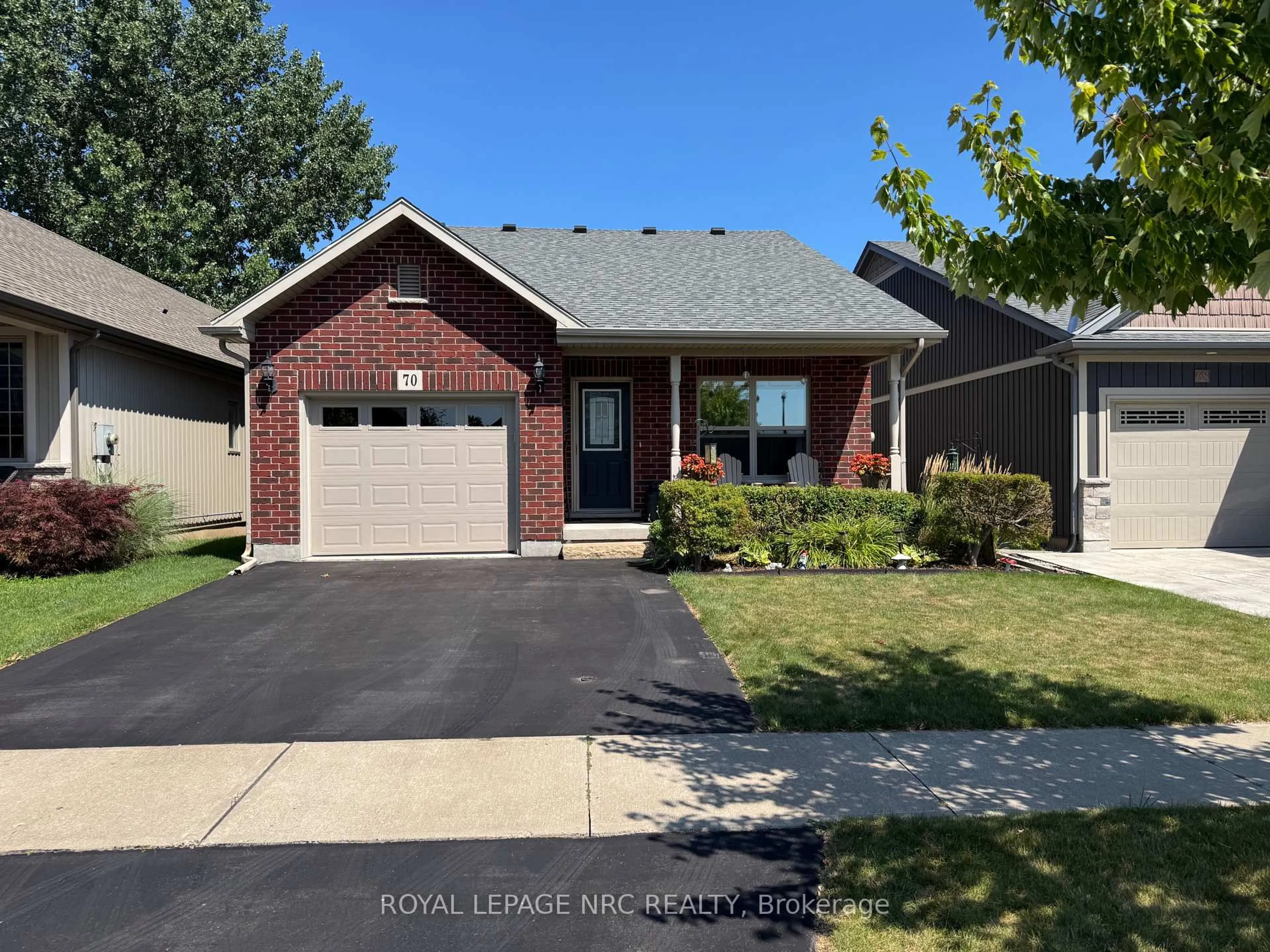 Home with brick exterior material, street for 70 Parkside Dr, St. Catharines Ontario L2M 1M4