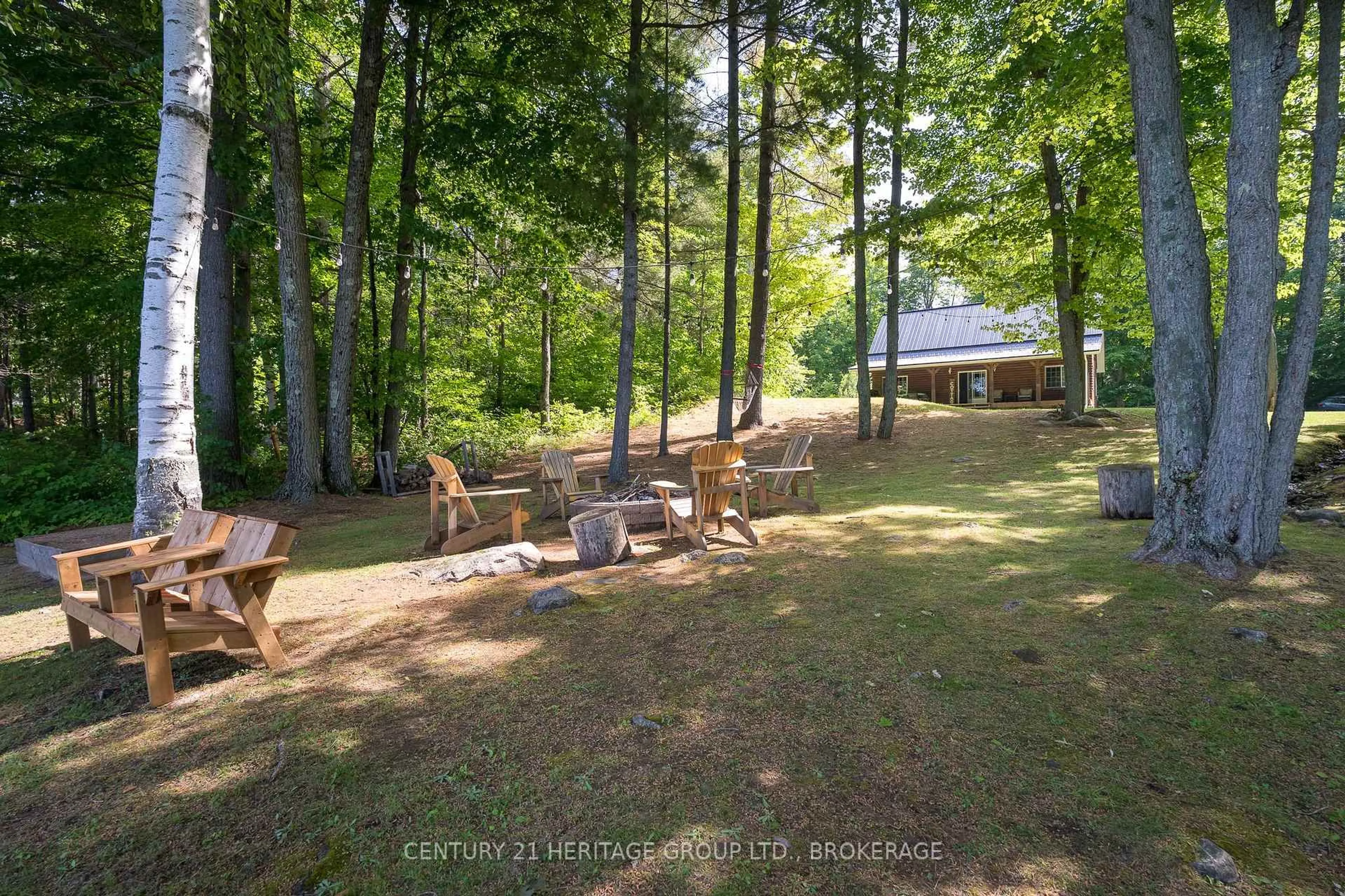 A pic from outside/outdoor area/front of a property/back of a property/a pic from drone, forest/trees view for 1147 Ducharme Rd, Sharbot Lake Ontario K0H 2P0