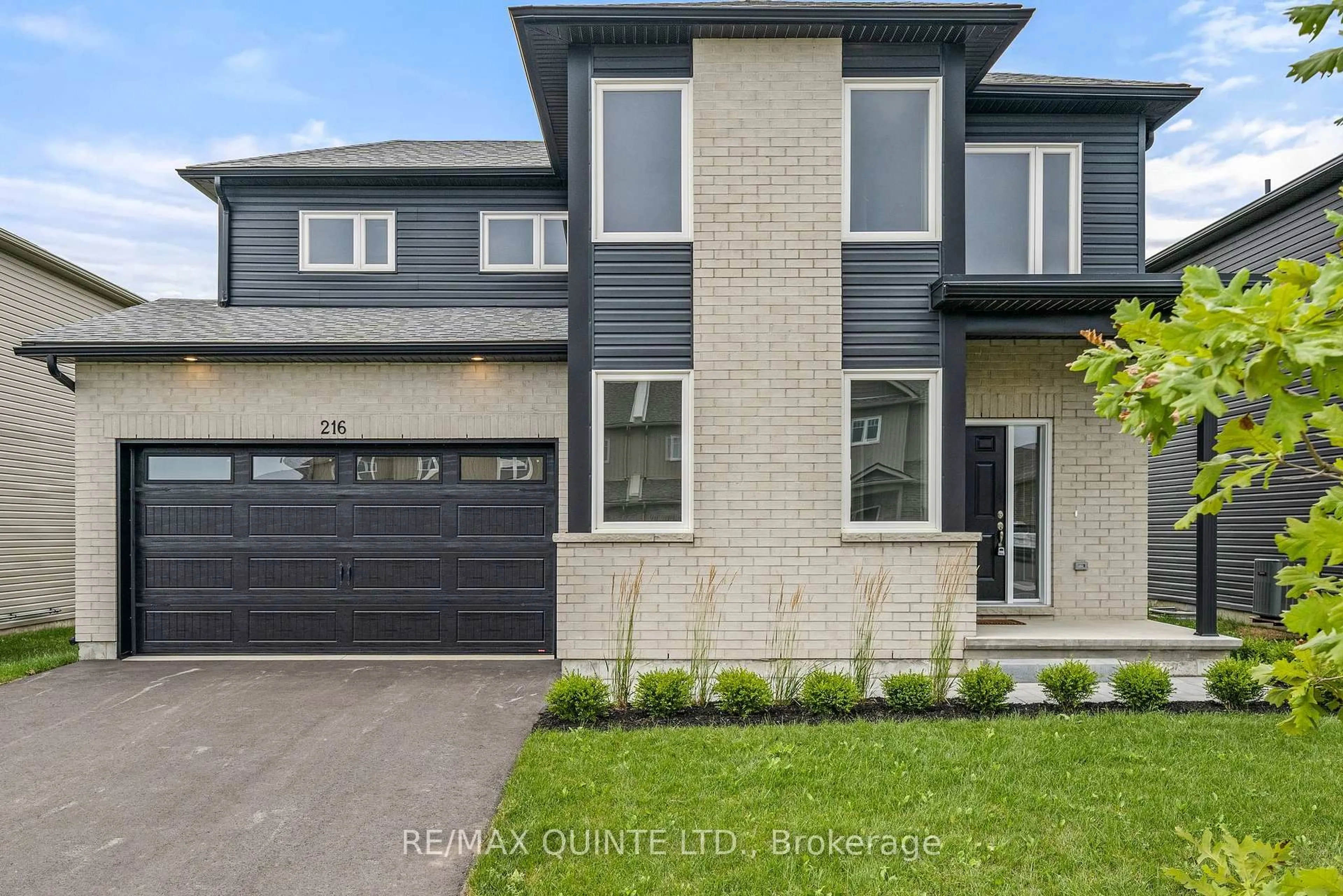 Home with brick exterior material, street for 216 Beasley Cres, Prince Edward County Ontario K0K 2T0
