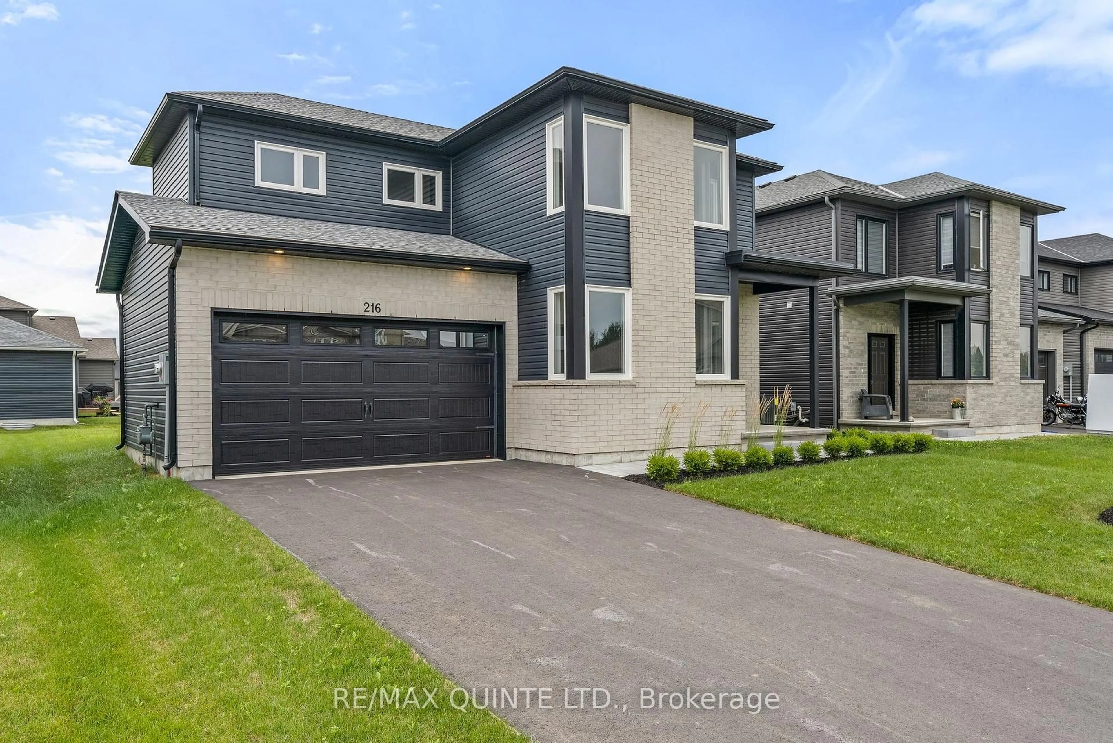 Home with vinyl exterior material, street for 216 Beasley Cres, Prince Edward County Ontario K0K 2T0