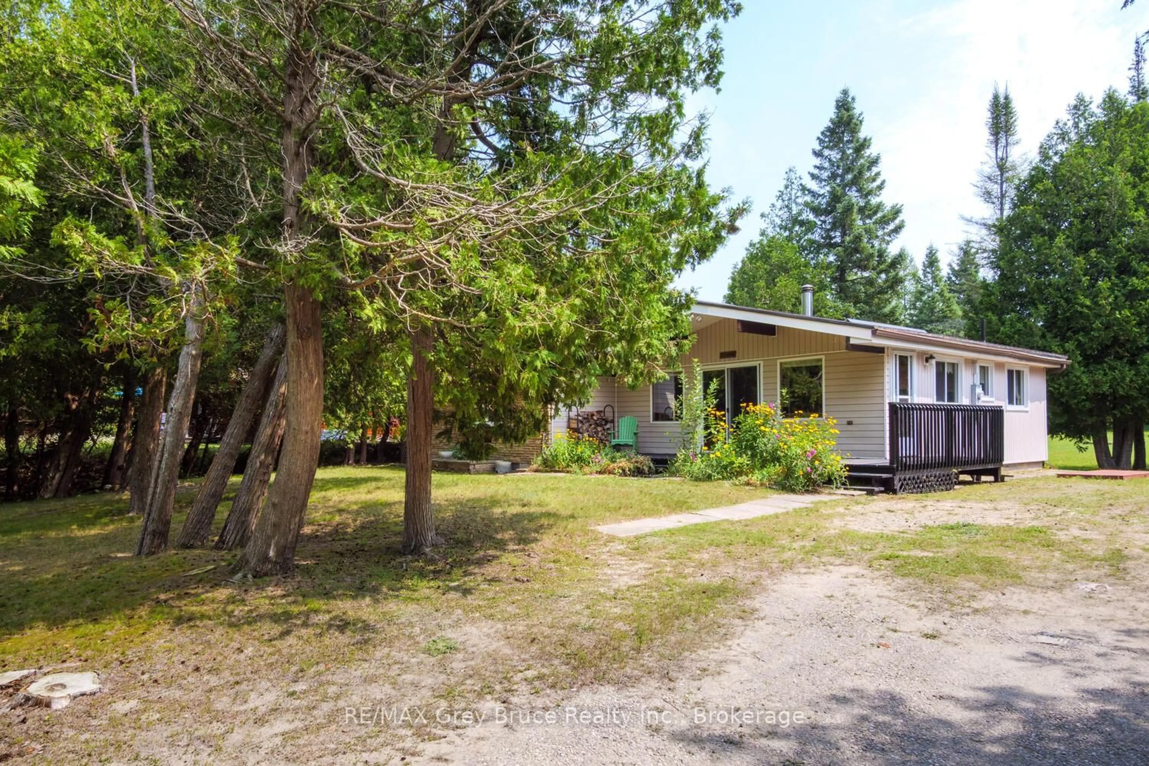 A pic from outside/outdoor area/front of a property/back of a property/a pic from drone, street for 465 Shoreline Ave, South Bruce Peninsula Ontario N0H 2T0