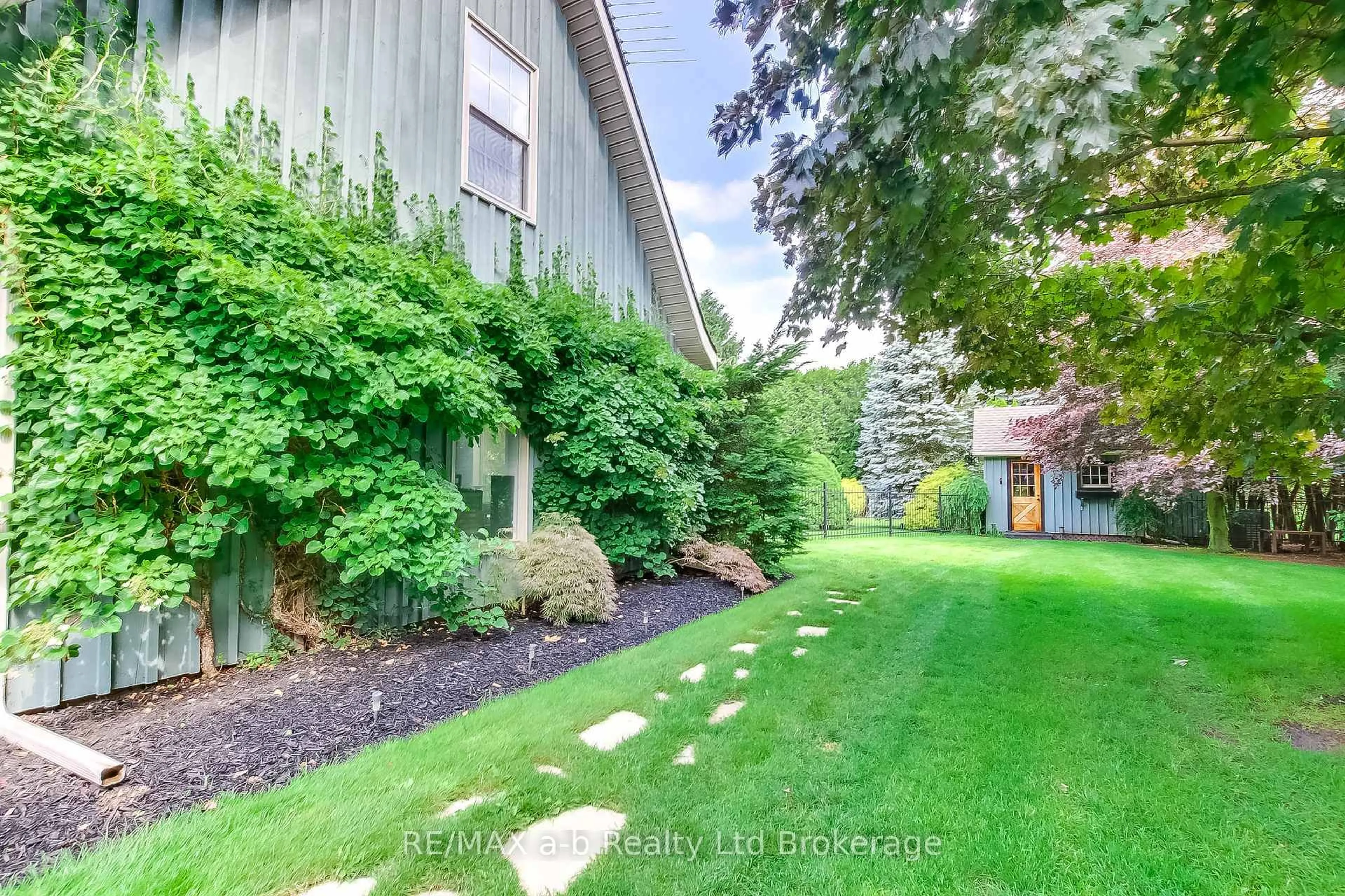 A pic from outside/outdoor area/front of a property/back of a property/a pic from drone, street for 81 Windham 9 Rd, Norfolk Ontario N0E 1H0