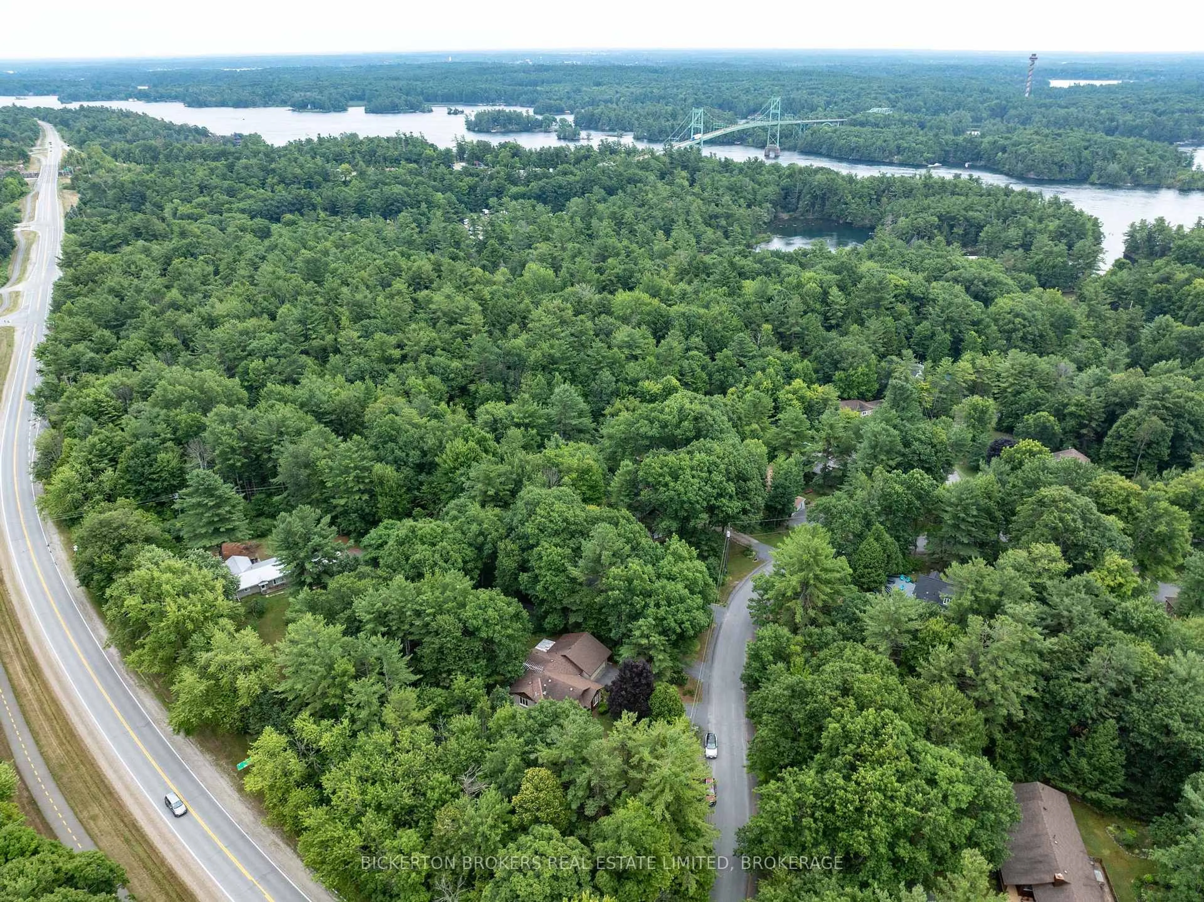 A pic from outside/outdoor area/front of a property/back of a property/a pic from drone, forest/trees view for 16 Village Estates Rd, Leeds and the Thousand Islands Ontario K0E 1L0