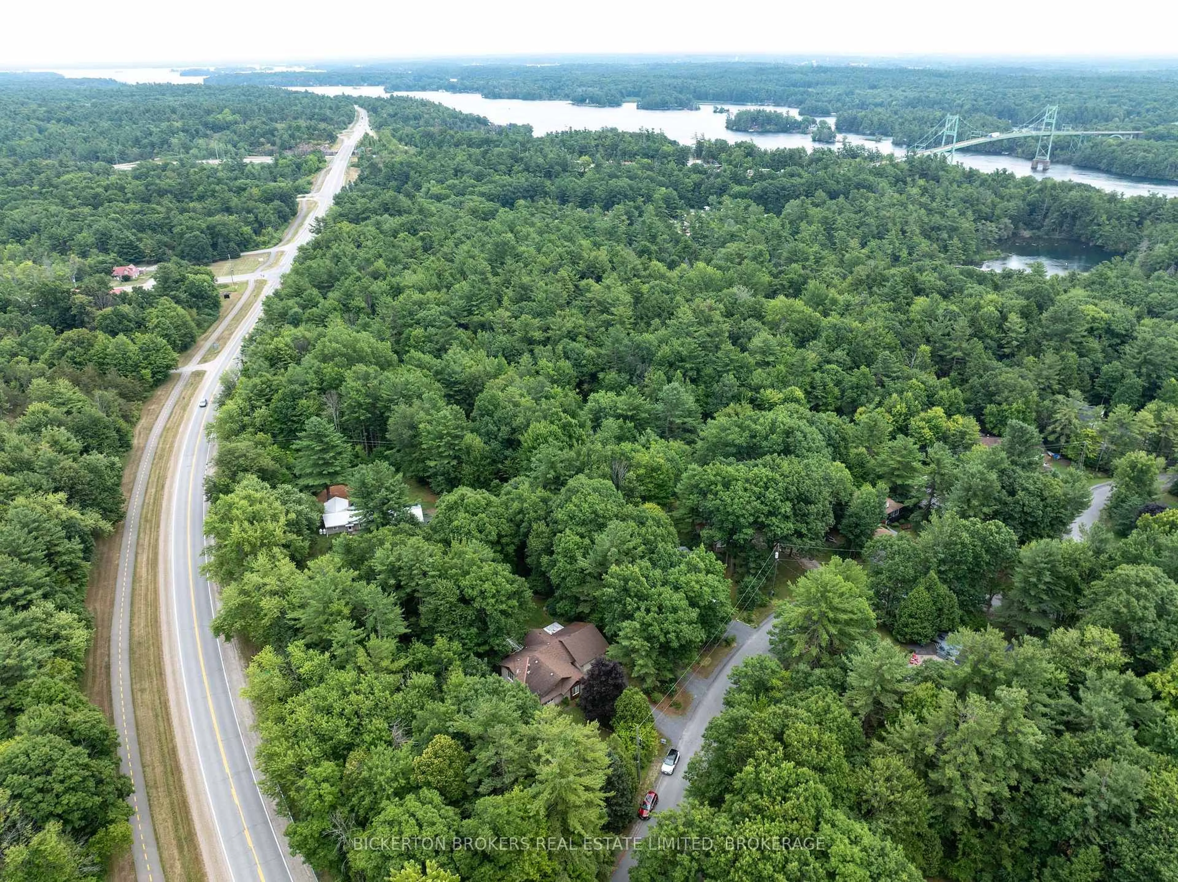 A pic from outside/outdoor area/front of a property/back of a property/a pic from drone, forest/trees view for 16 Village Estates Rd, Leeds and the Thousand Islands Ontario K0E 1L0