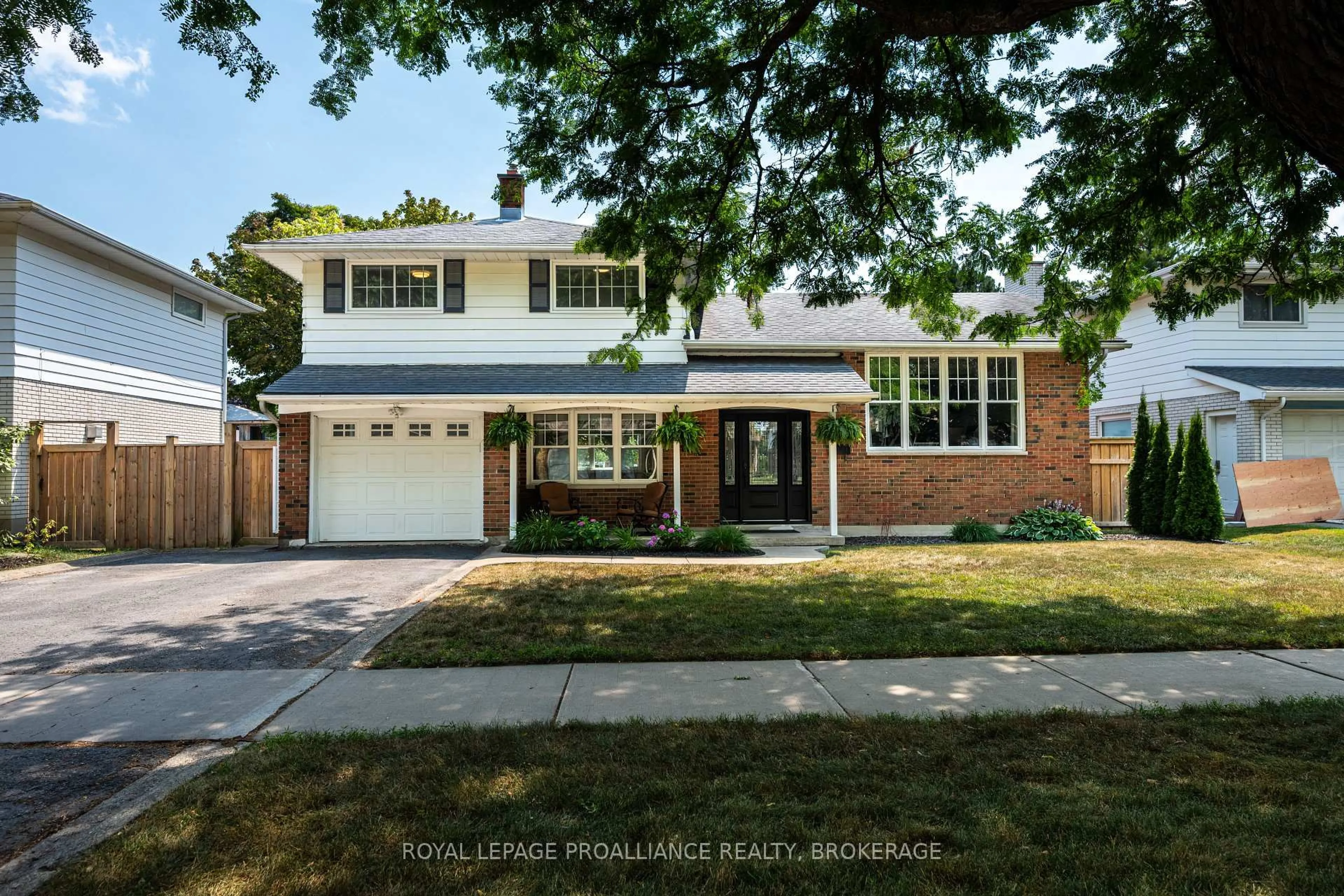 Home with brick exterior material, street for 228 Glengarry Rd, Kingston Ontario K7M 3J4