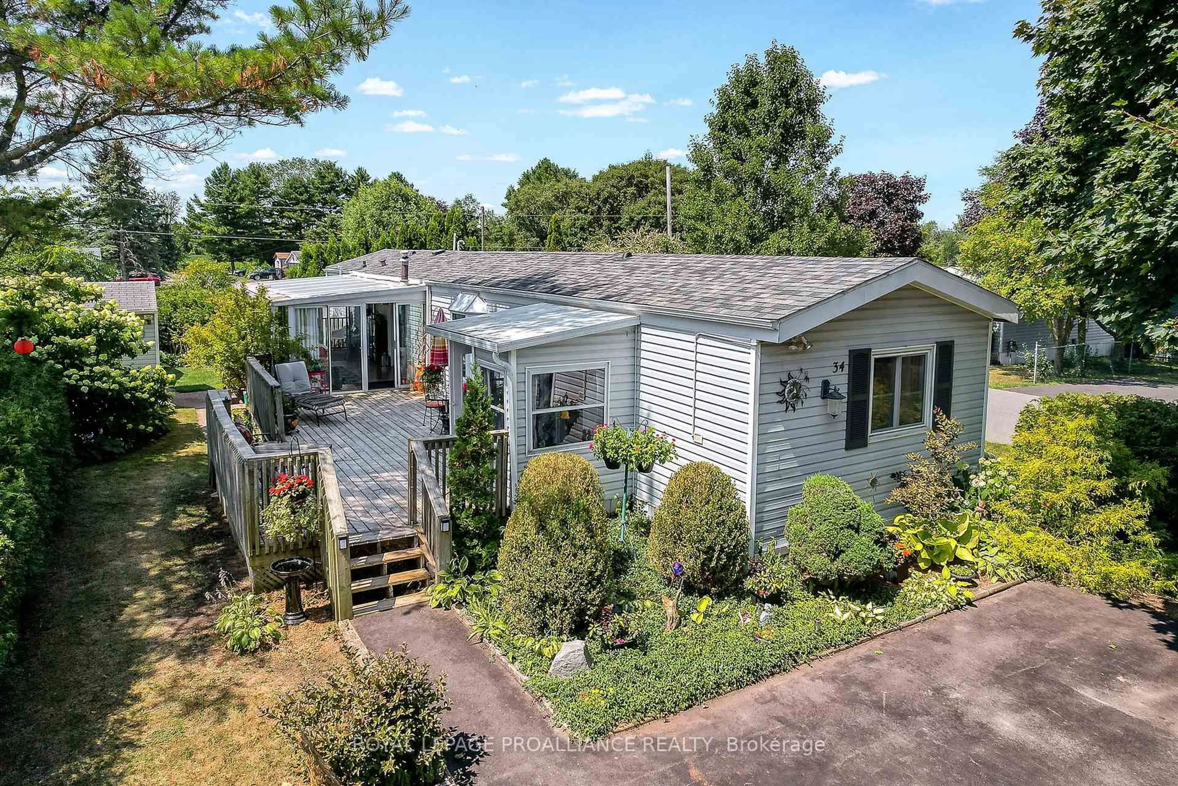 A pic from outside/outdoor area/front of a property/back of a property/a pic from drone, street for 34 Basher Dr, Hamilton Township Ontario K9A 4J7
